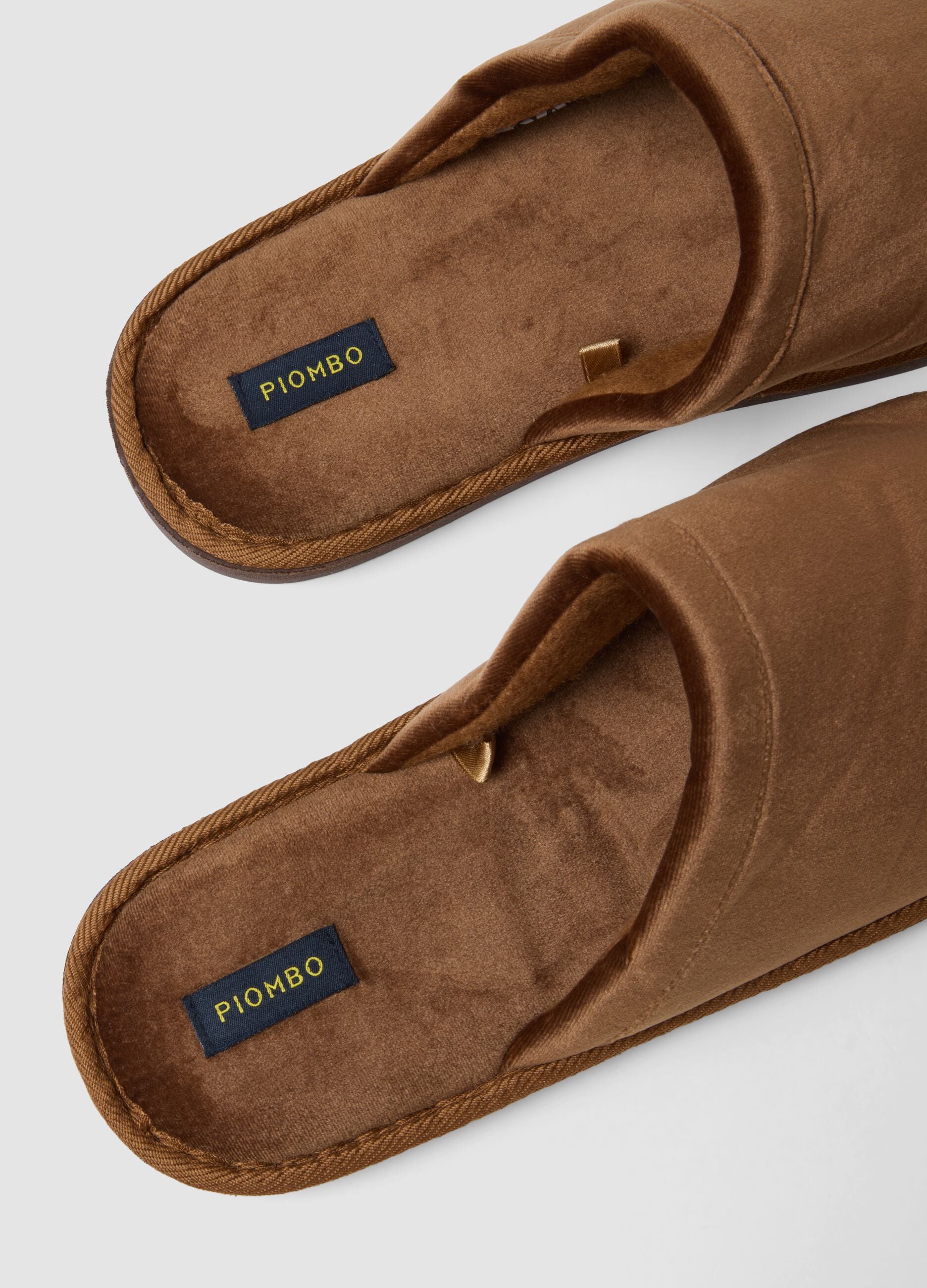 Brown slip-on house slippers with full lining