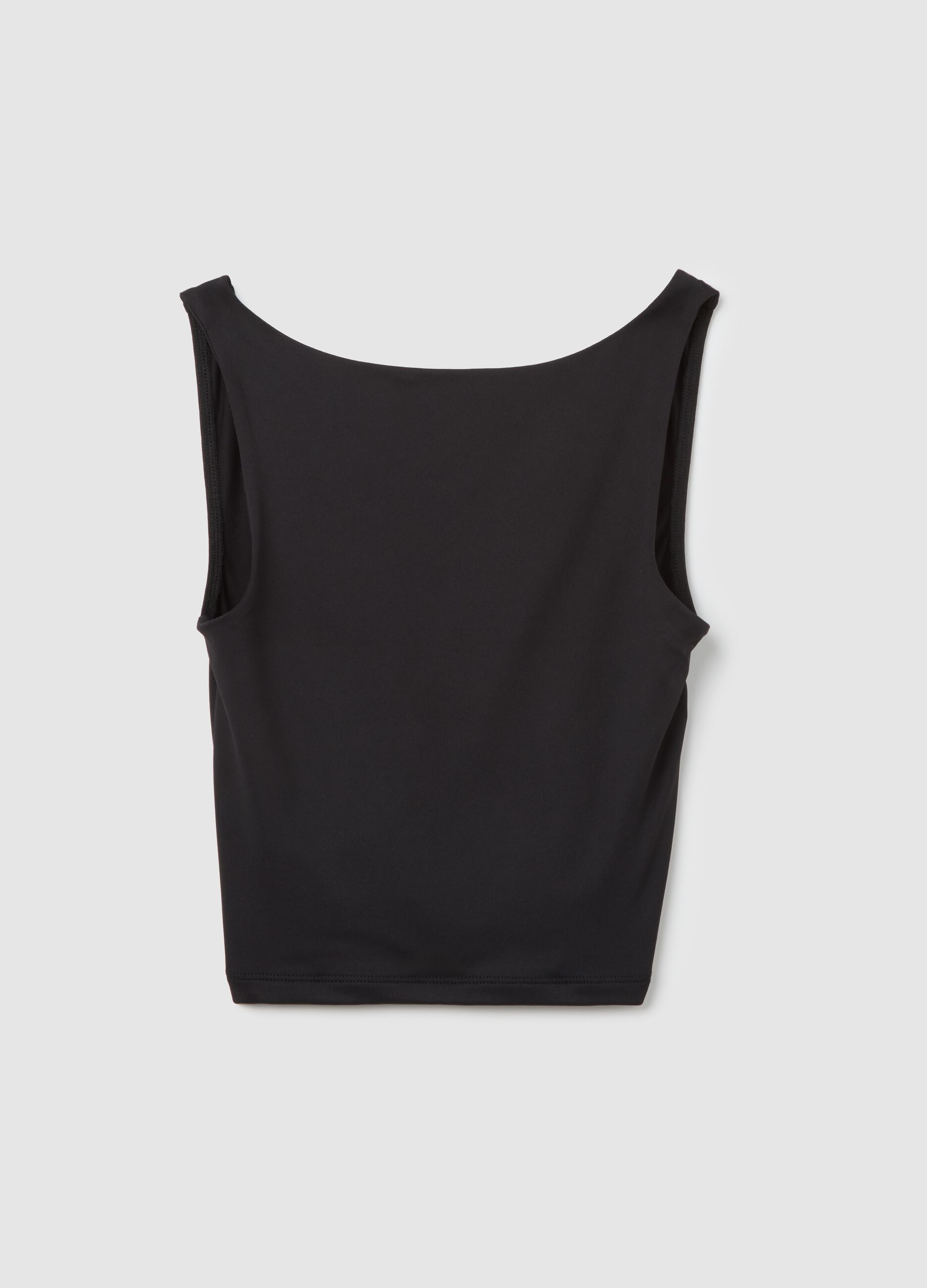 Women’s fitted top in black stretch fabric with wide straps