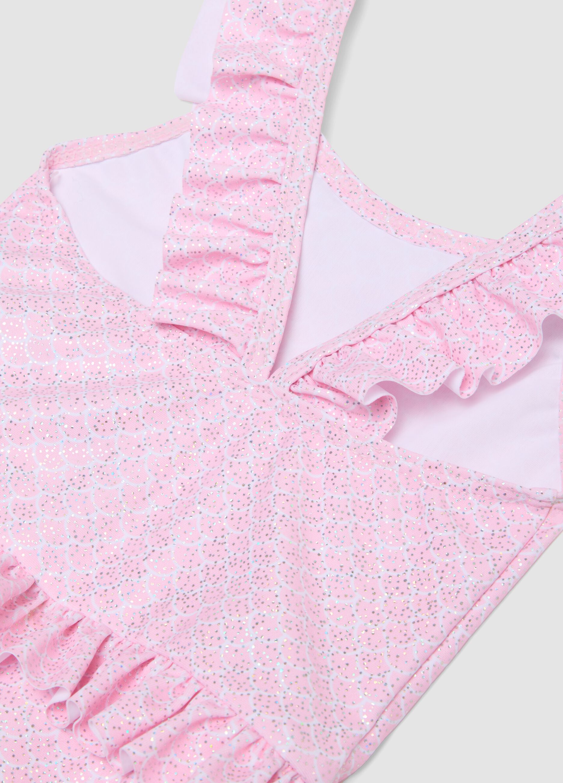 Pink stretch swimsuit with ruffles for baby girls