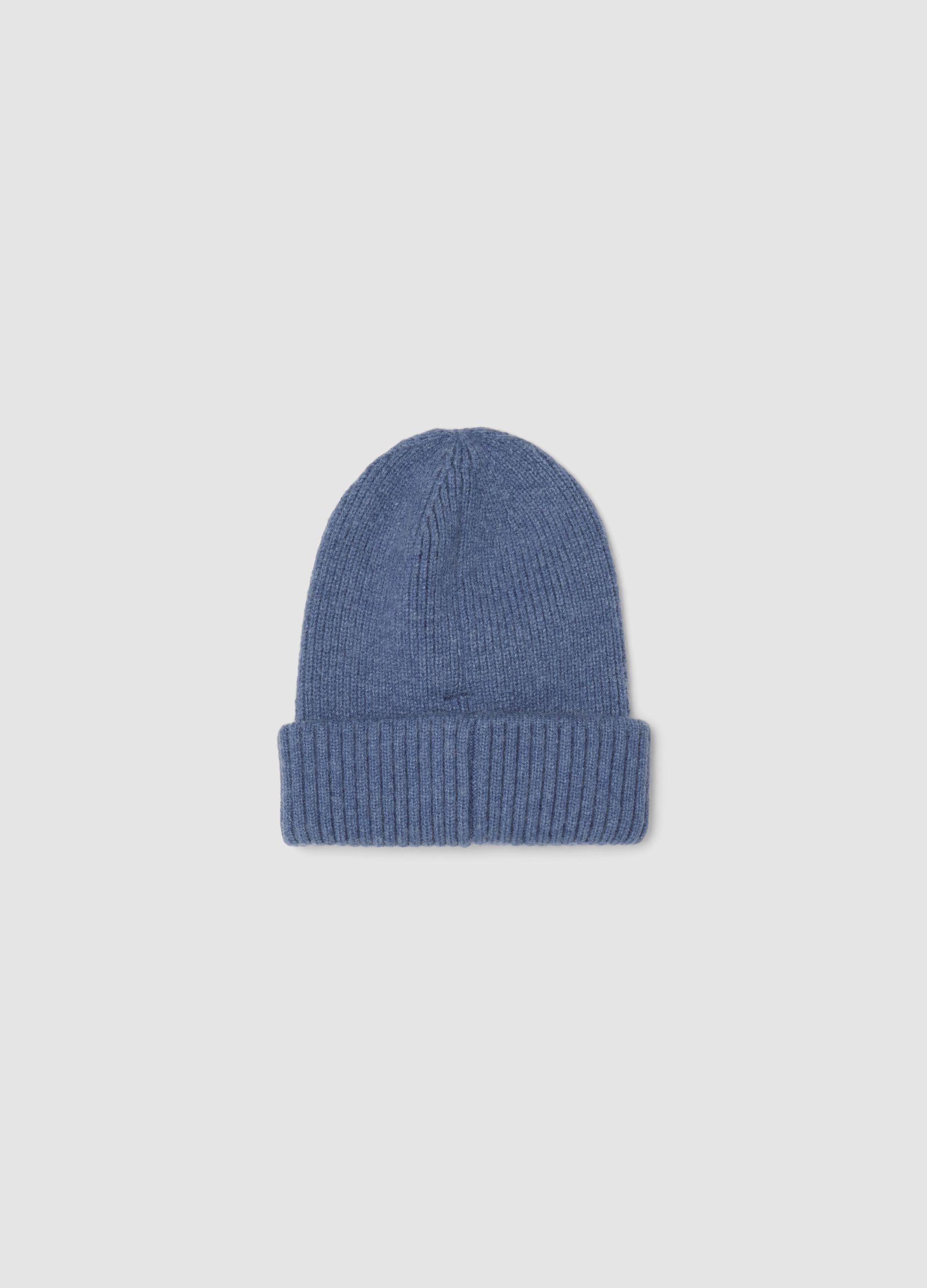 Blue ribbed knit beanie with turn-up cuff