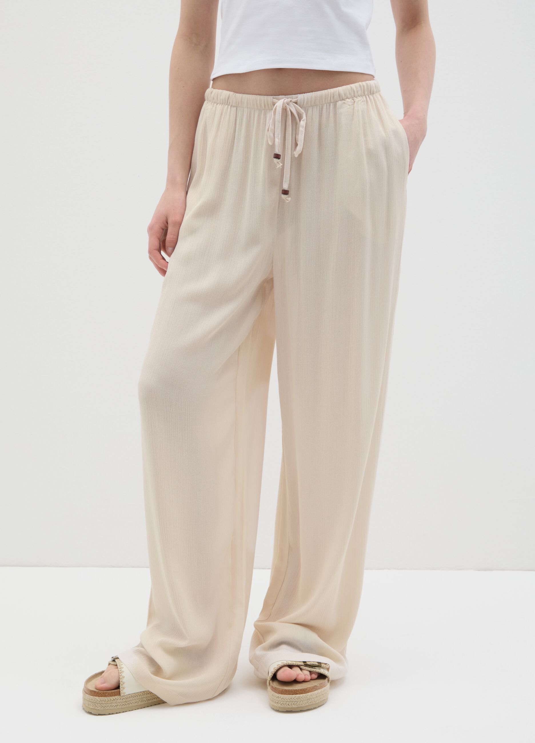 Women's beige relaxed-fit trousers in 100% viscose
