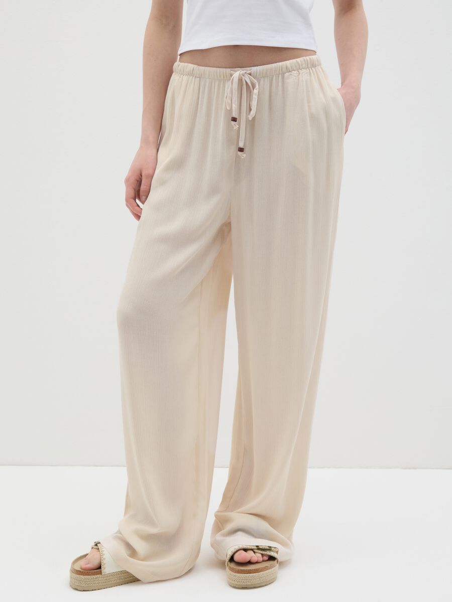 Women's beige relaxed-fit trousers in 100% viscose_1