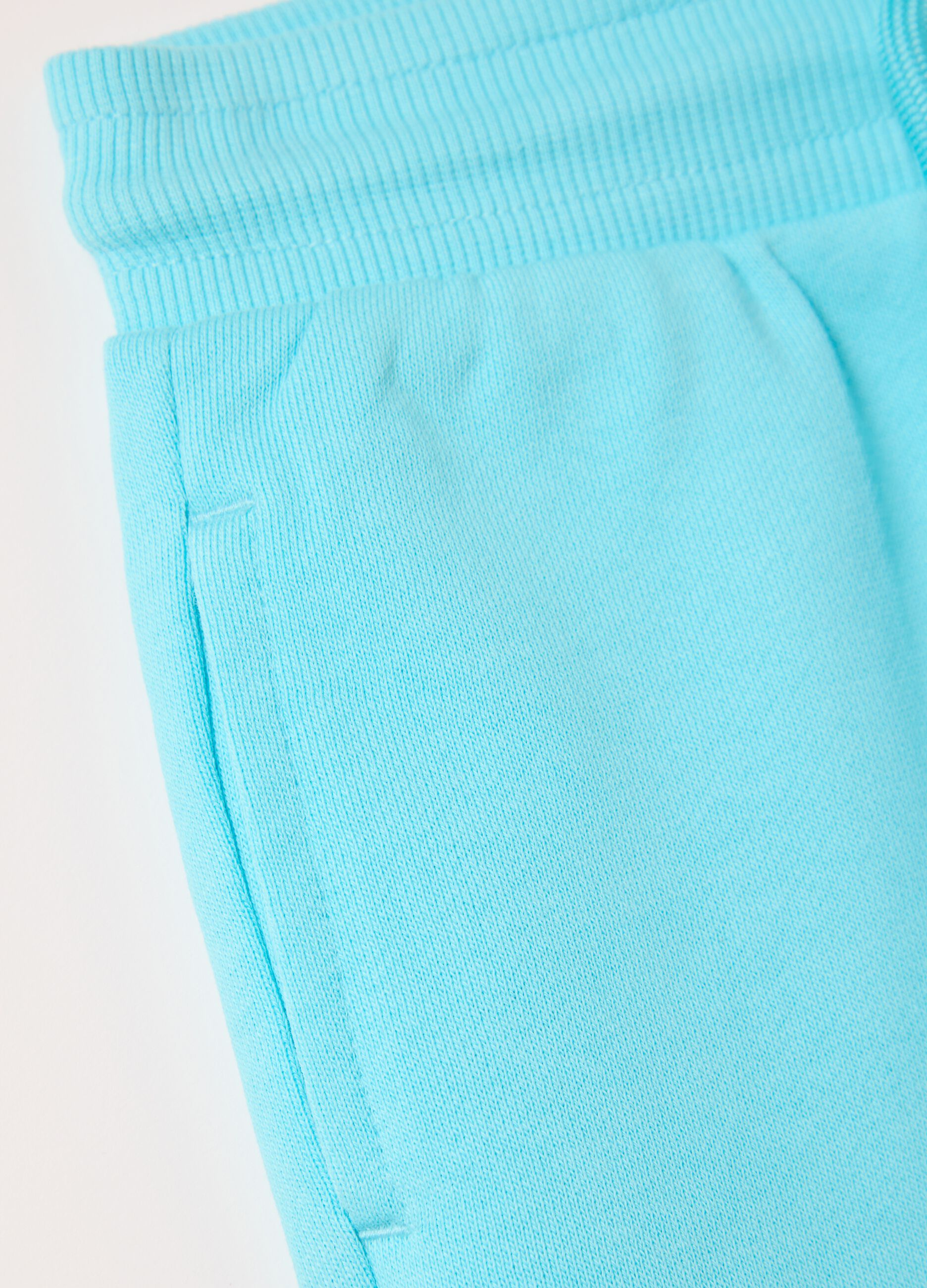 Light blue French terry shorts with drawstring