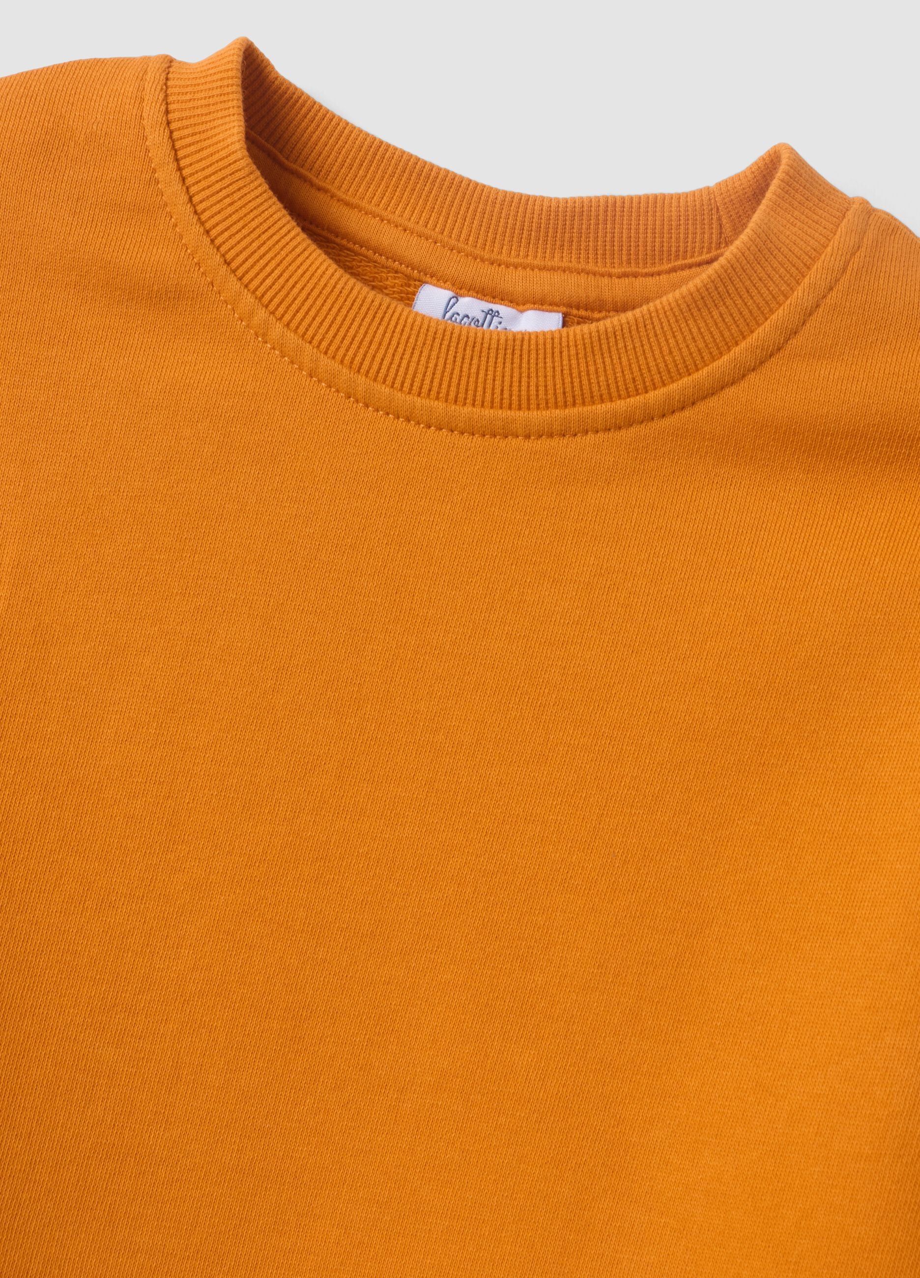 Orange oversized sweatshirt in pure organic cotton for boys