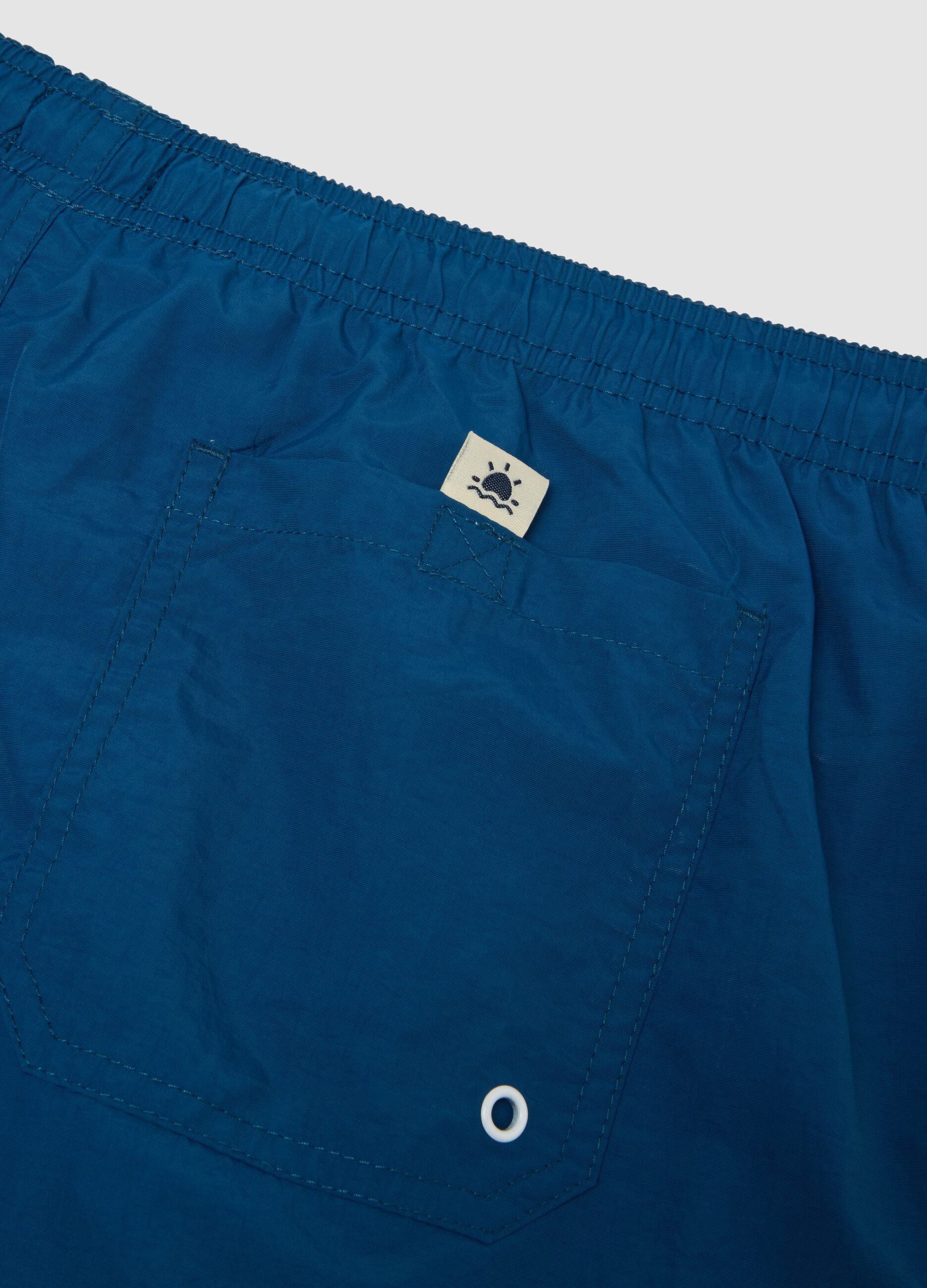 Blue regular-fit swim shorts with drawstring