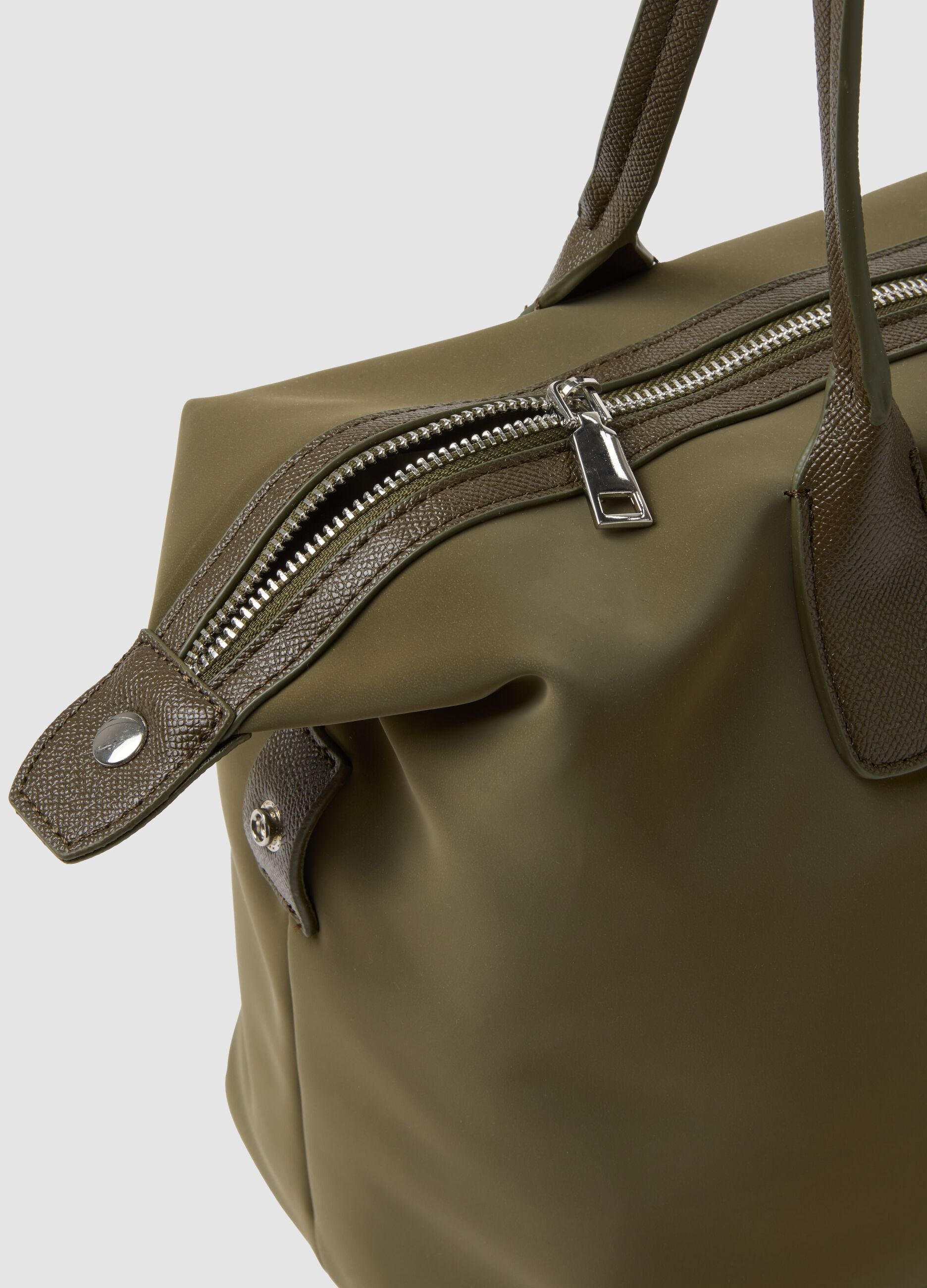Green handbag with double handles and zip fastening