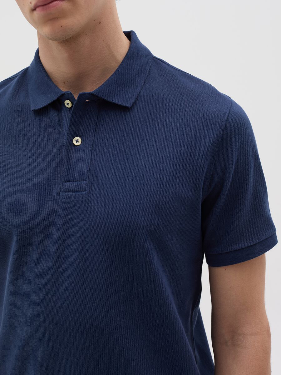 Solid colour polo shirt in organic cotton_2