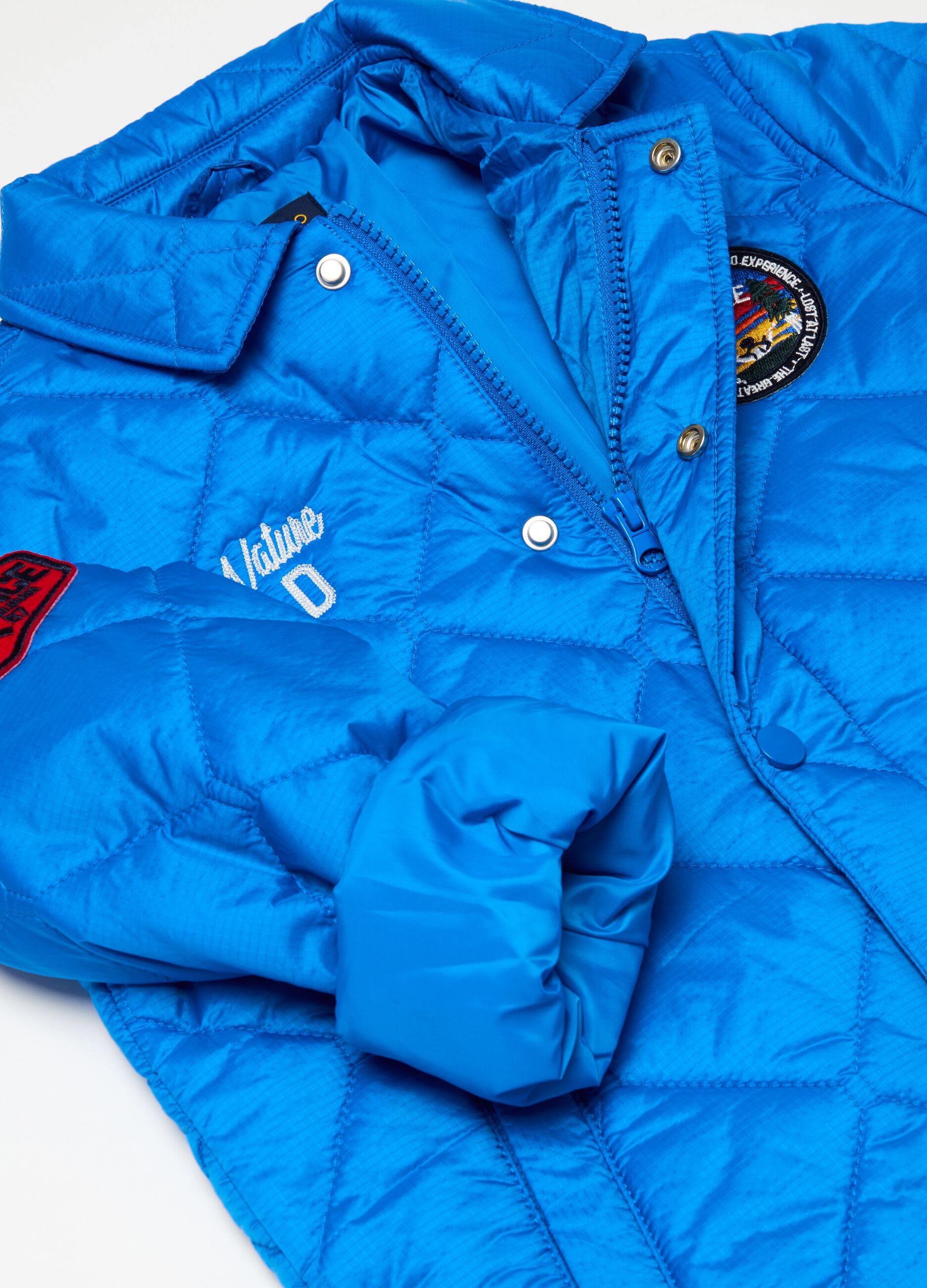 Quilted jacket with patches