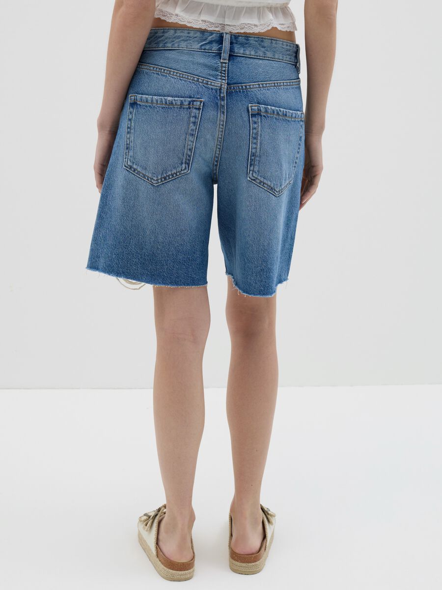 Five-pocket denim shorts with ripped details_3