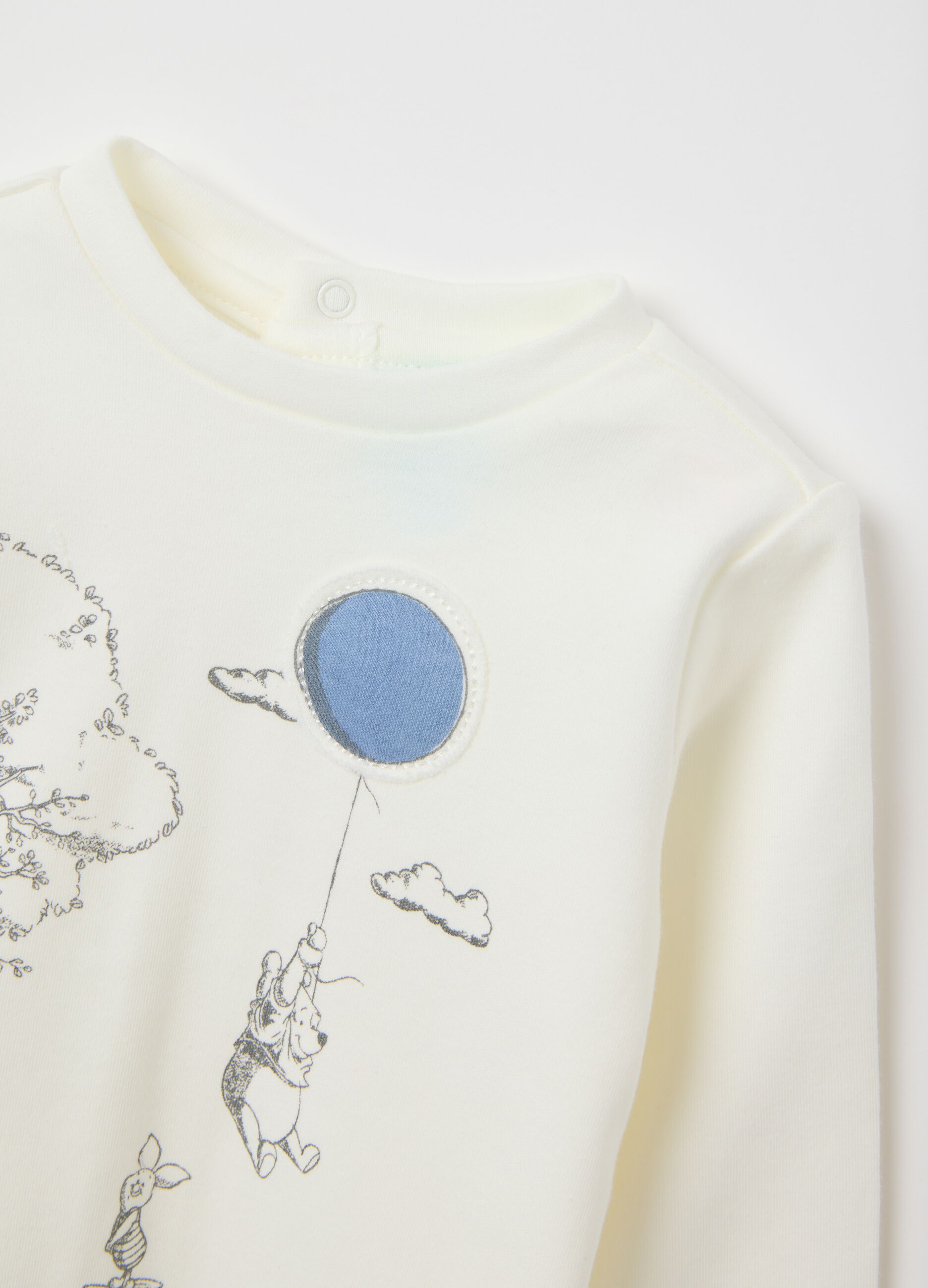 Newborn long-sleeve top in pure white cotton