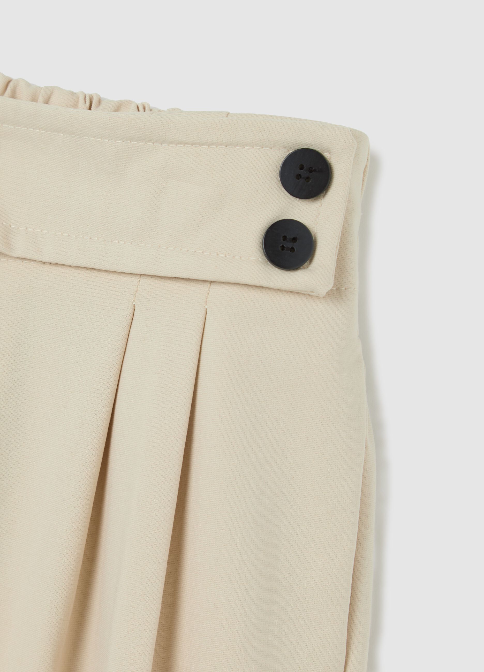 Beige trousers with darts