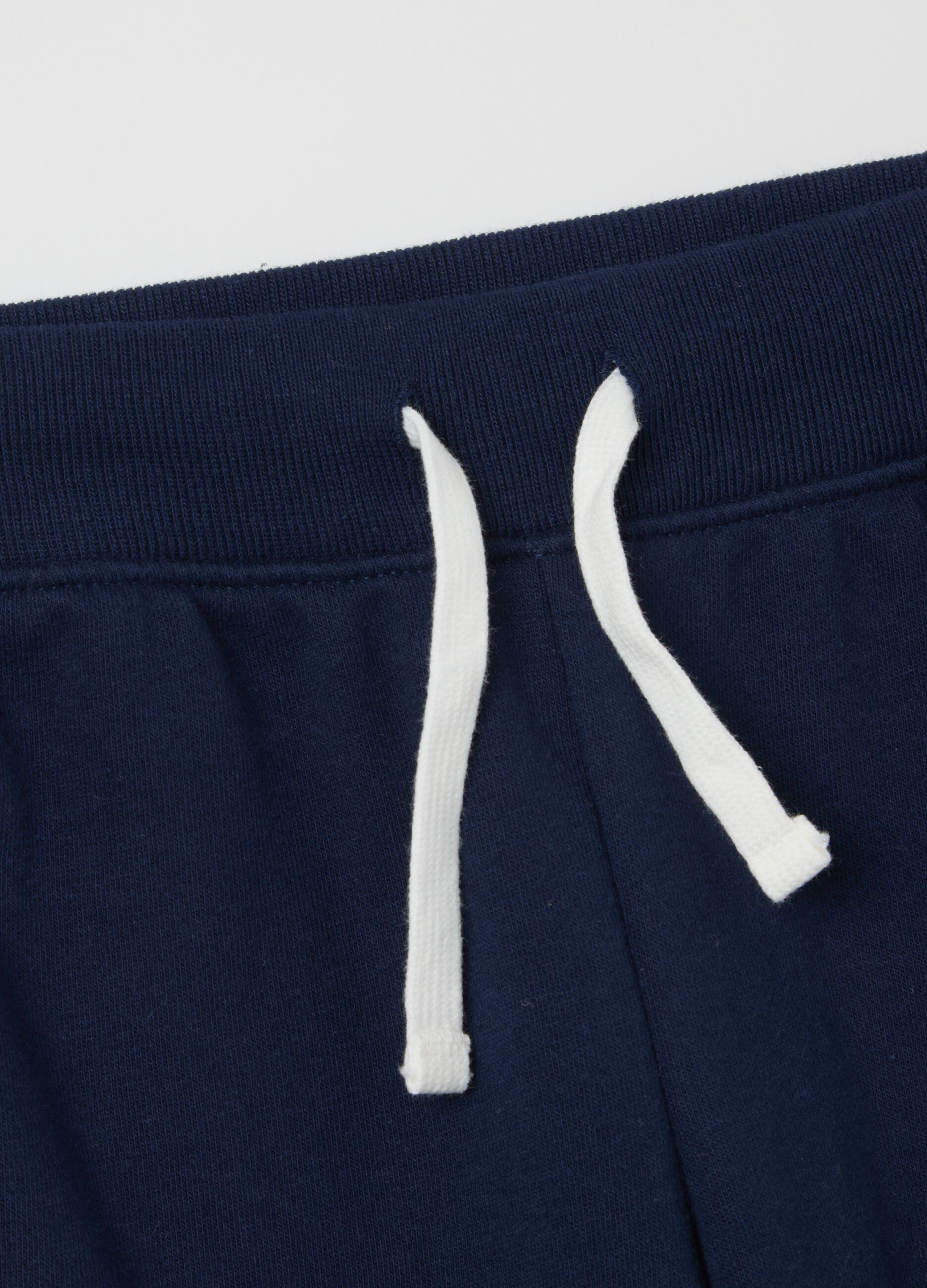 Blue joggers with logo