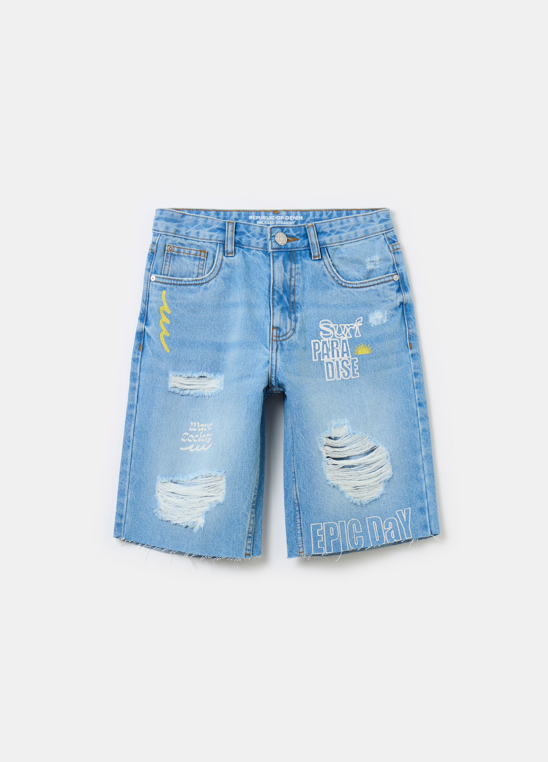 Bermuda in denim con abrasioni e stampa