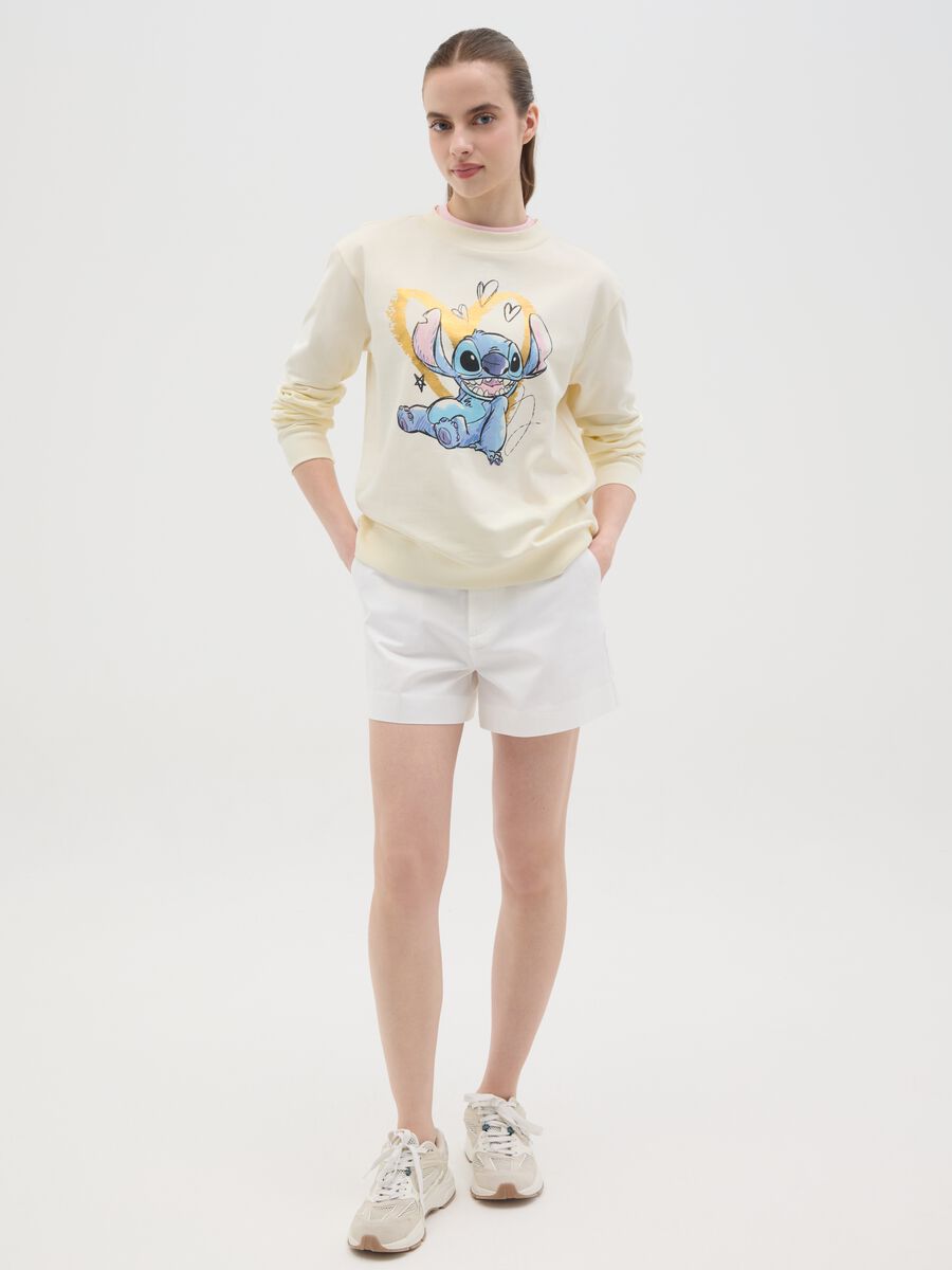 White sweatshirt with Stitch print in foil_1