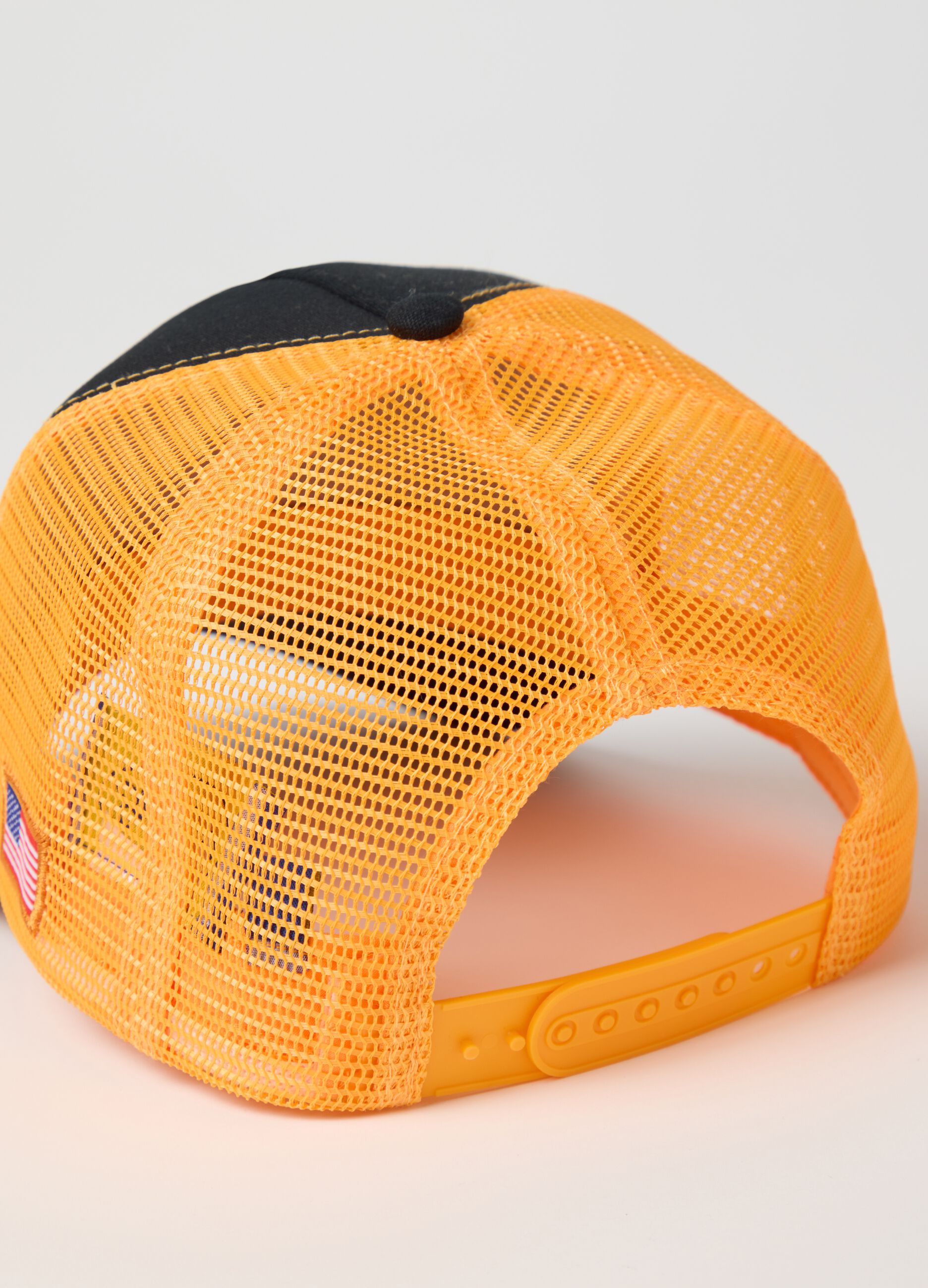 Black and orange baseball cap with tiger patch