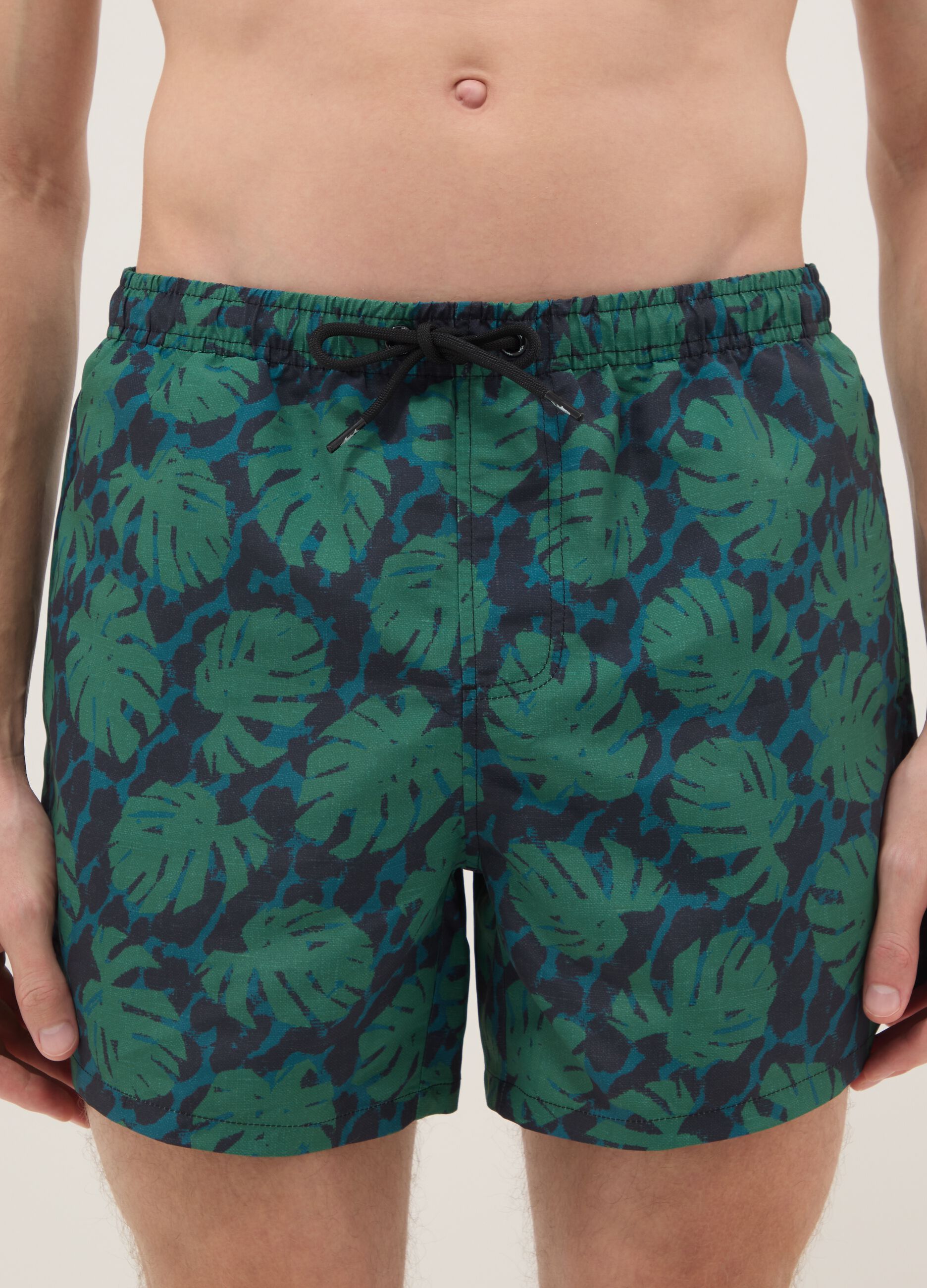 Multicolour tropical print swim shorts