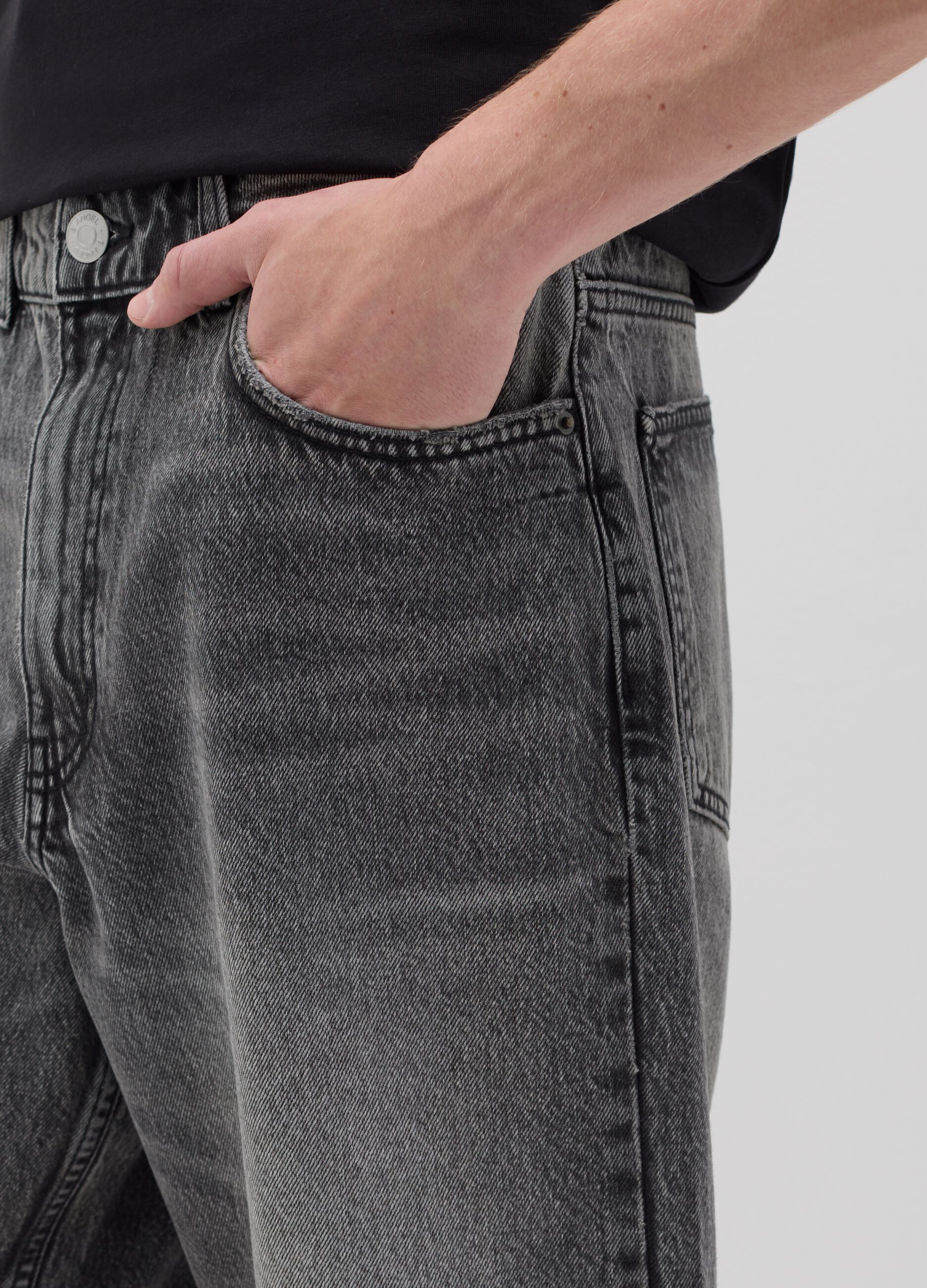 Black denim shorts with ripped details