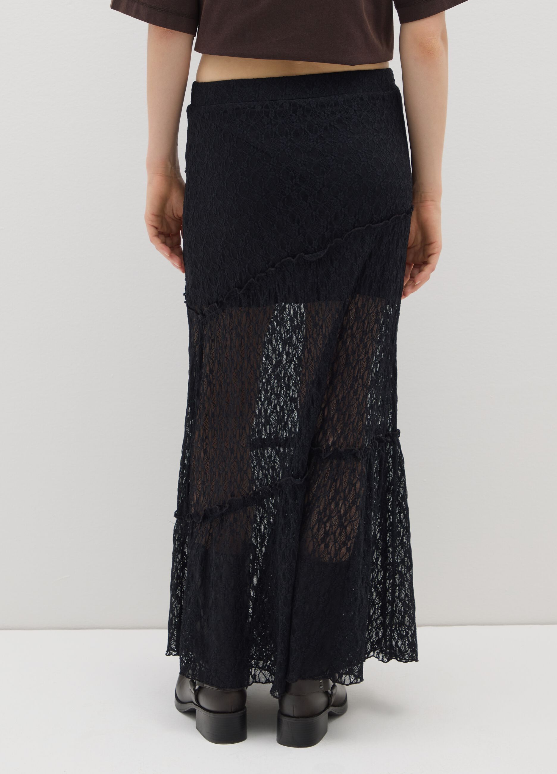 Long black lace skirt with asymmetric design