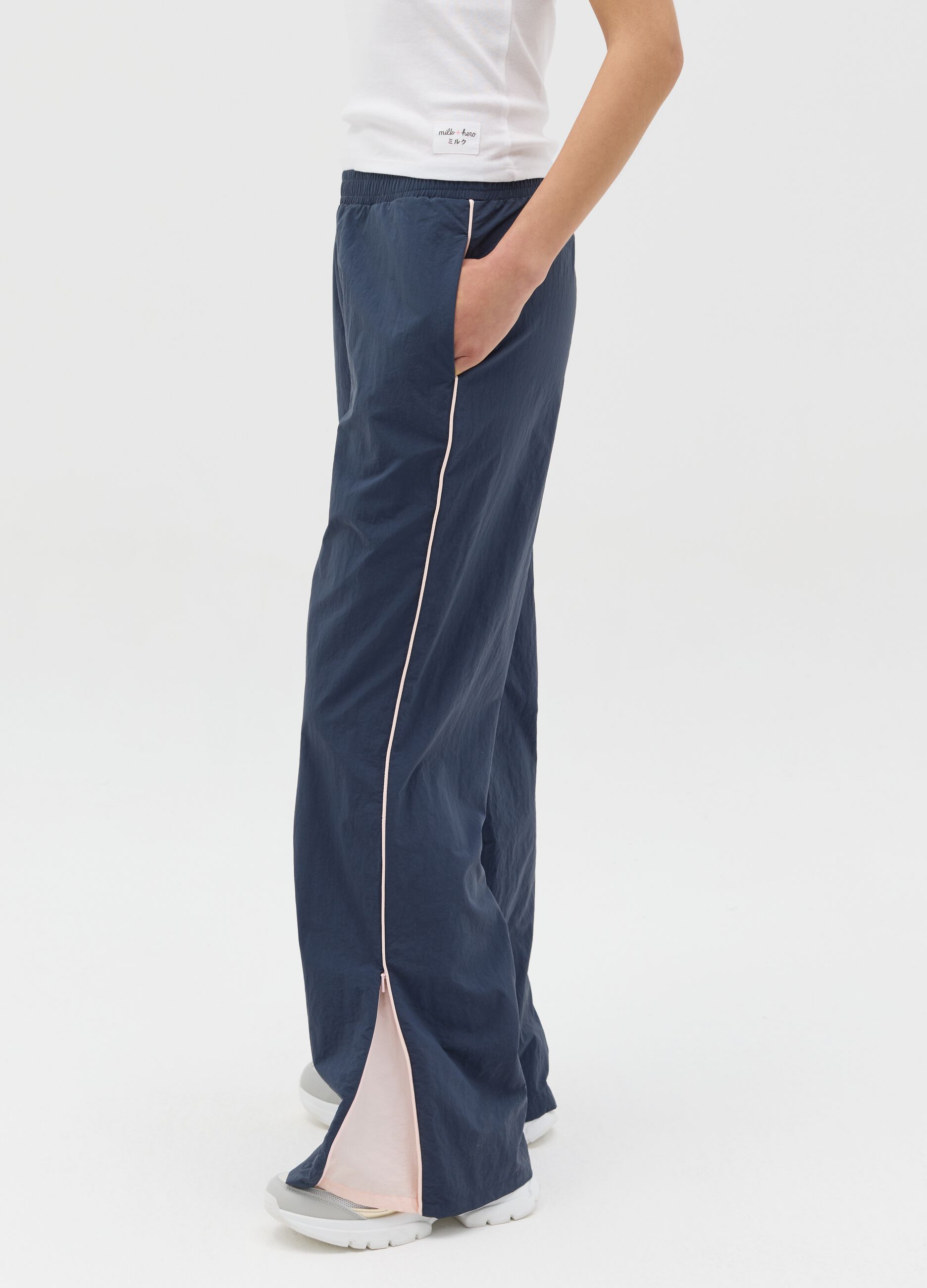 Navy blue nylon joggers with splits and zip