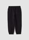 Pantaloni jogger neri in puro cotone con stampa a scacchi_1