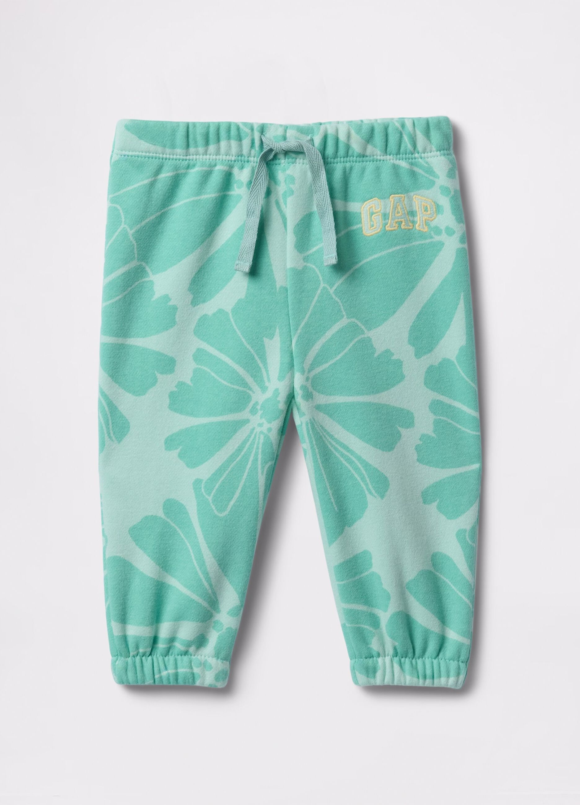 Light blue joggers with drawstring, logo embroidery and flowers print