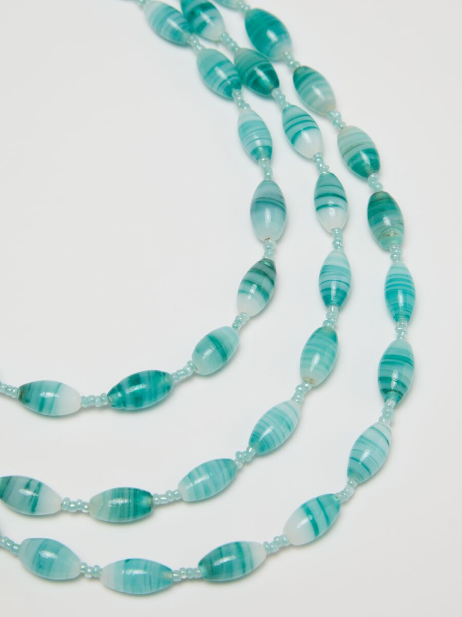Multi-strand necklace with light blue beads_2