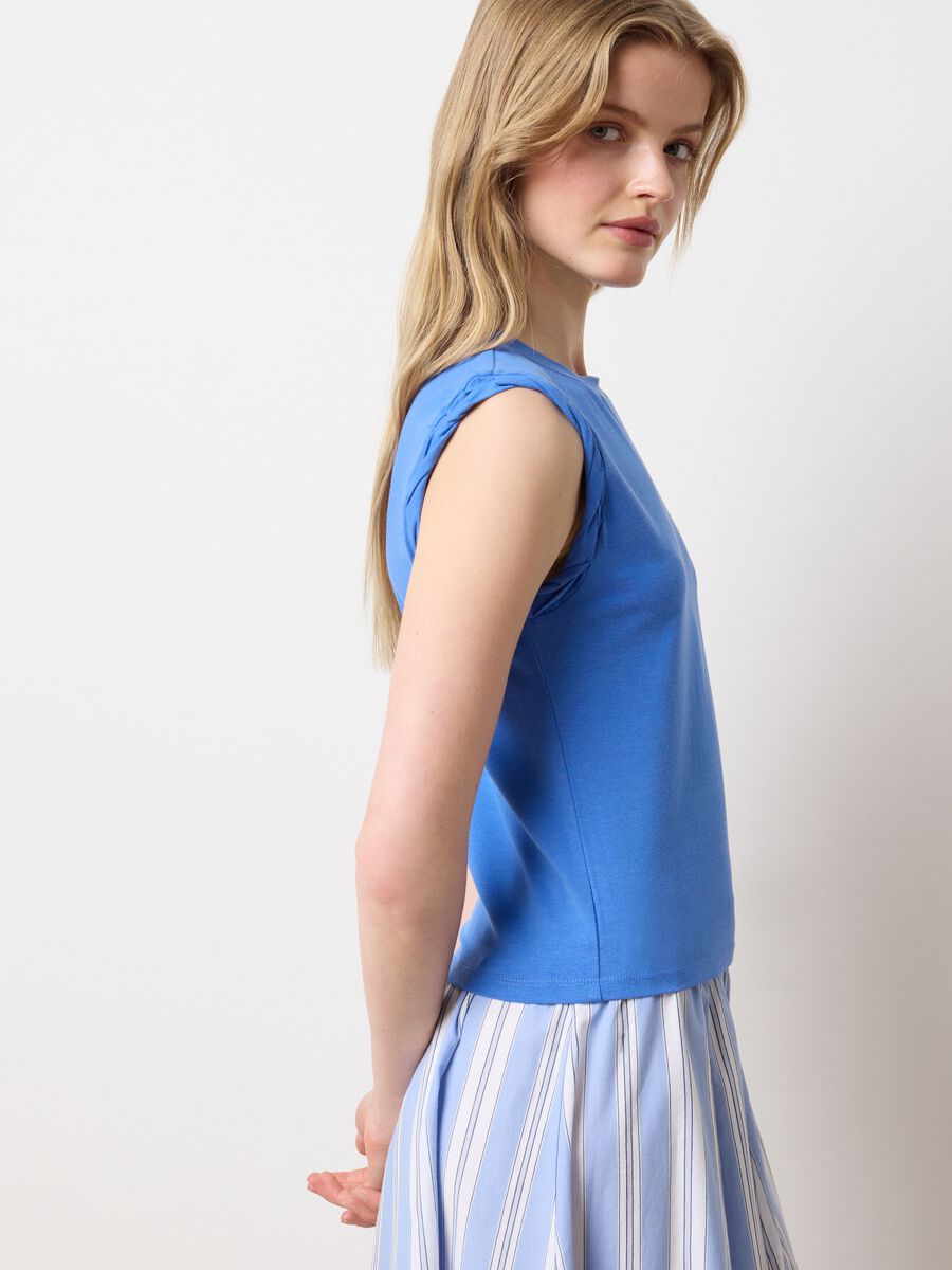 Light blue vest with rolled detail_0