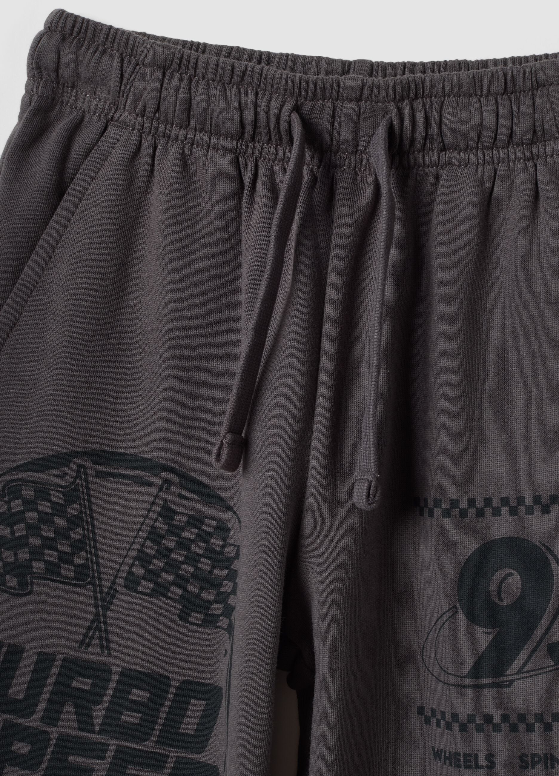 Pantaloni jogger grigi in puro cotone con stampa sportiva
