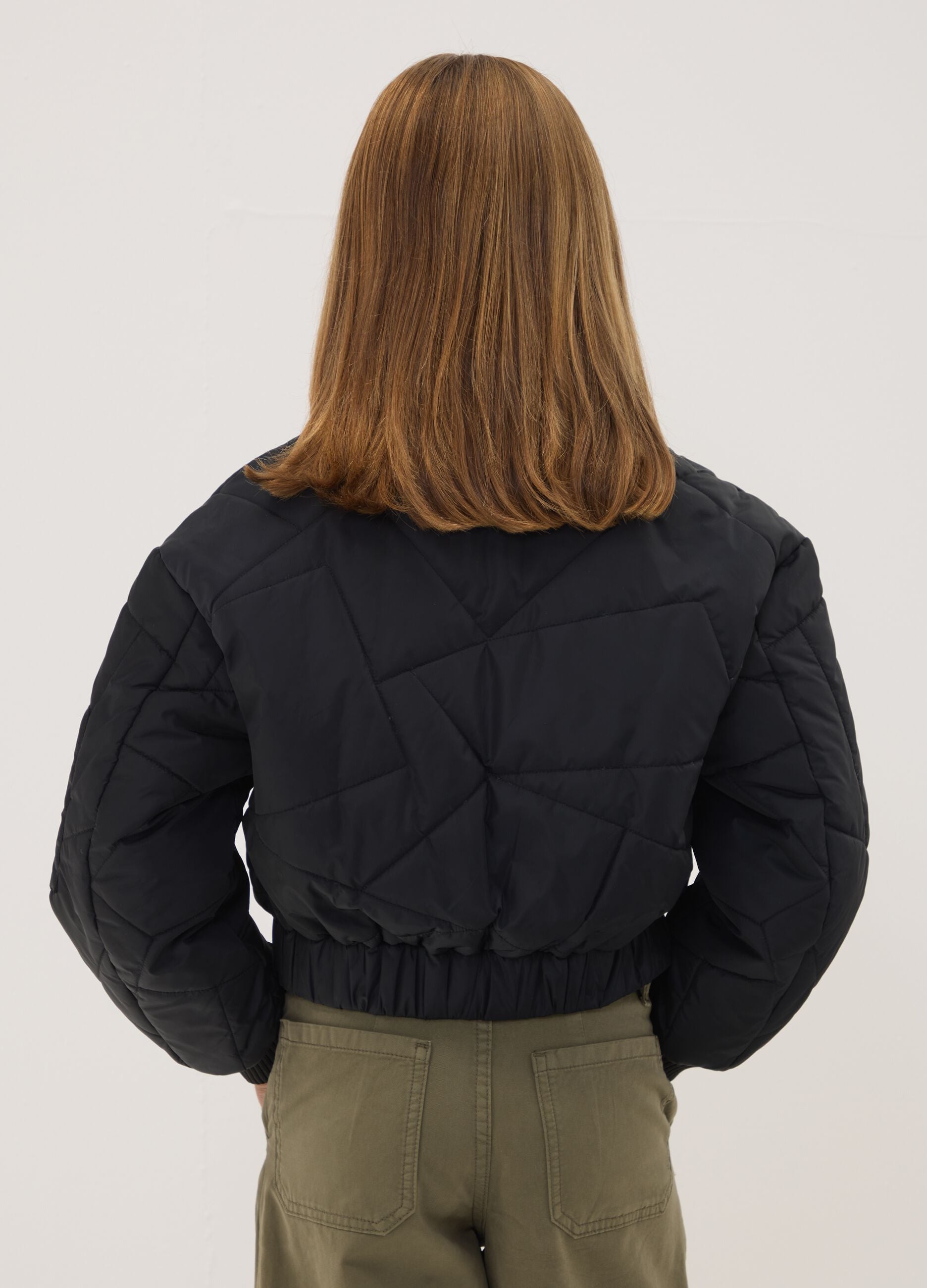 Black padded jacket with zip and high neck