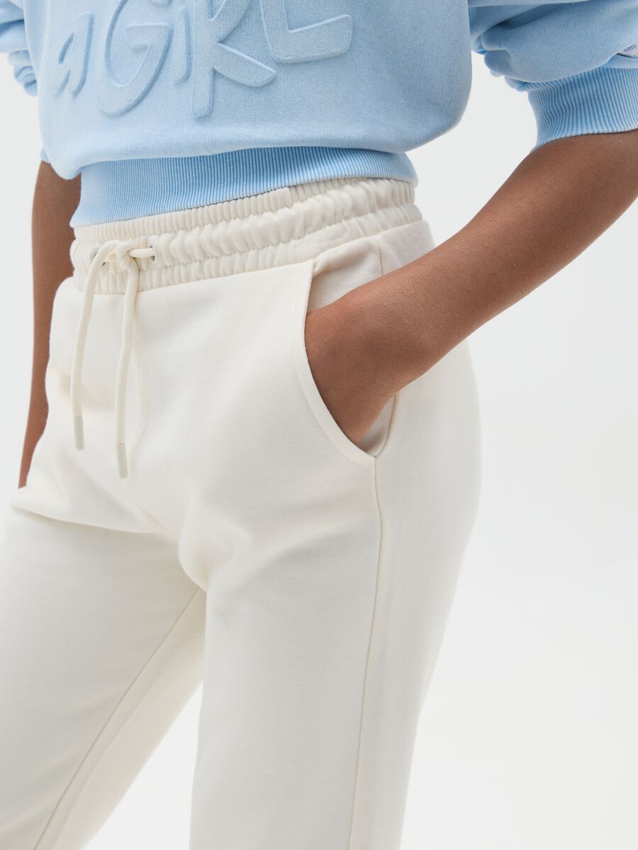 Girls' beige flare trousers in pure cotton_2