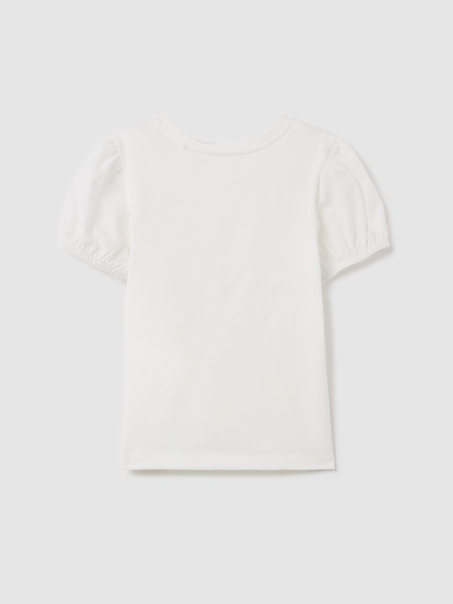T-shirt with flowers application and pompoms_1