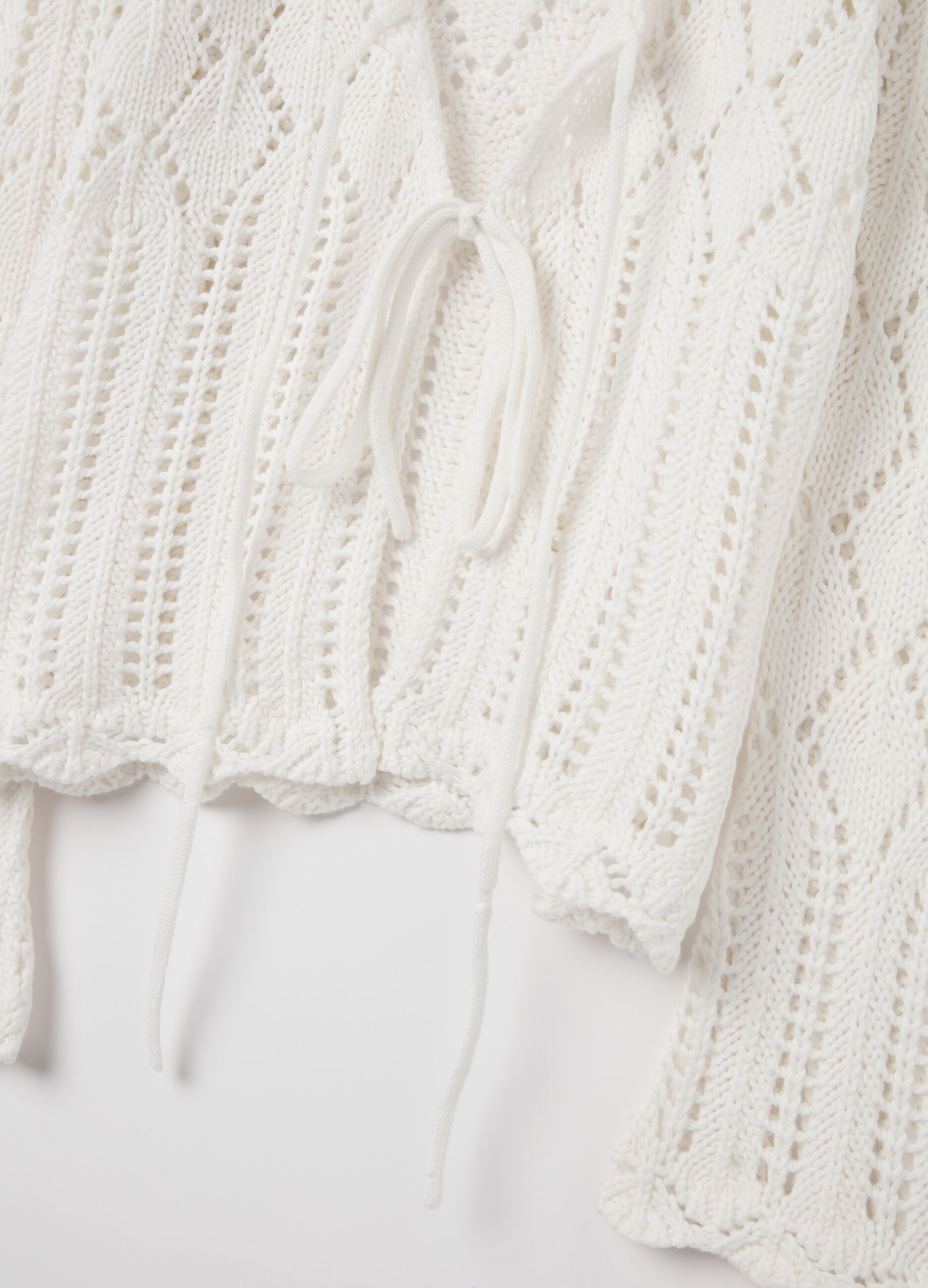 Crochet cardigan with laces