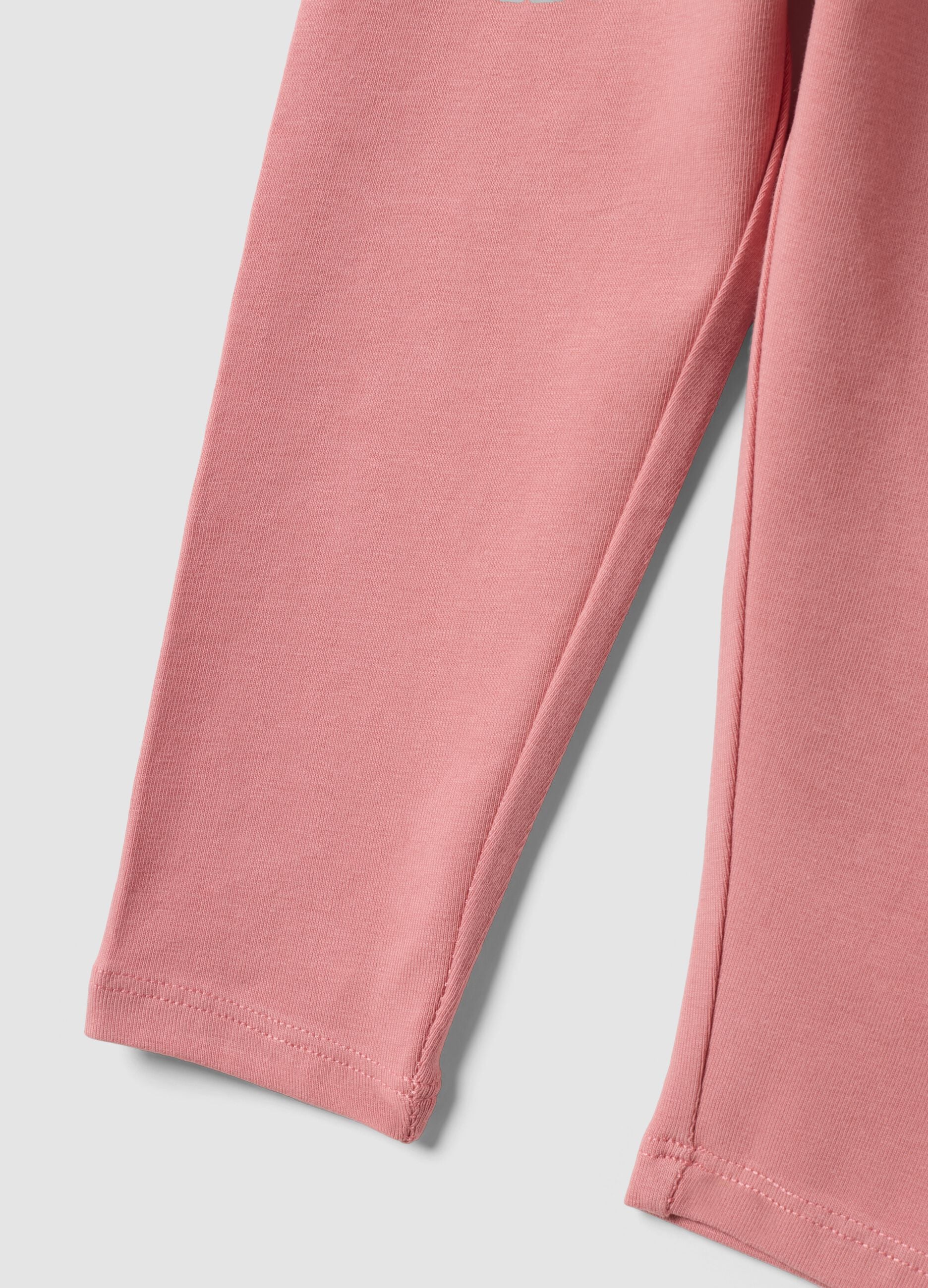 Leggings rosa in cotone organico elasticizzato slim fit per bimba
