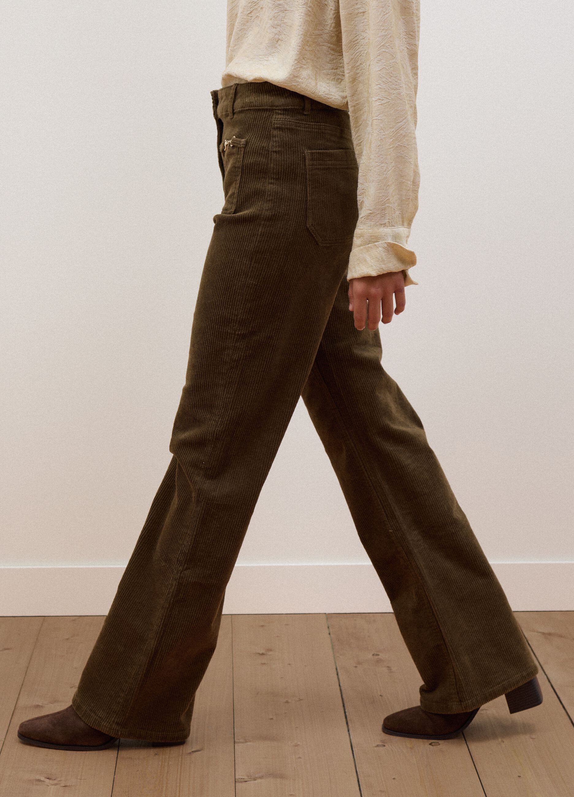 Green flared ribbed stretch-cotton trousers