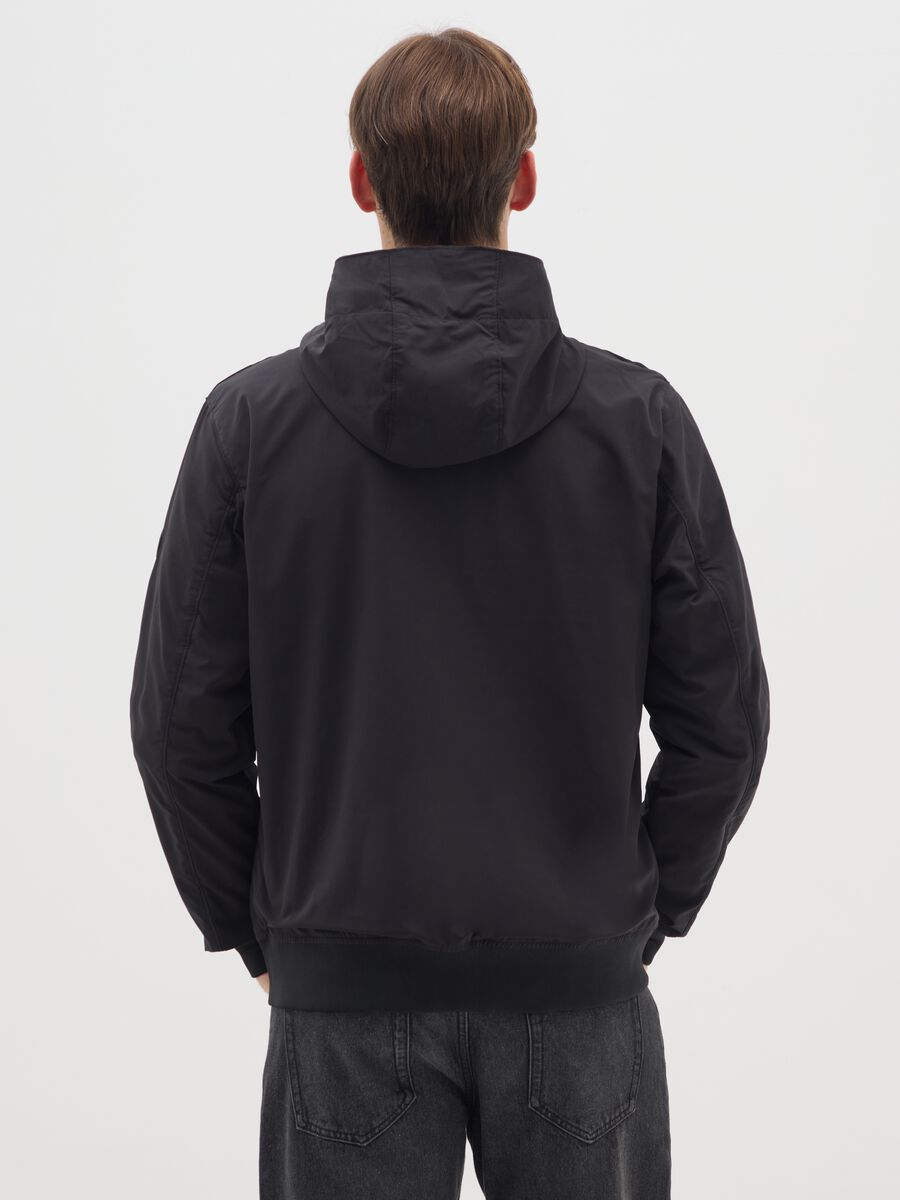 Black jacket in heavy fabric with hood and zip_2