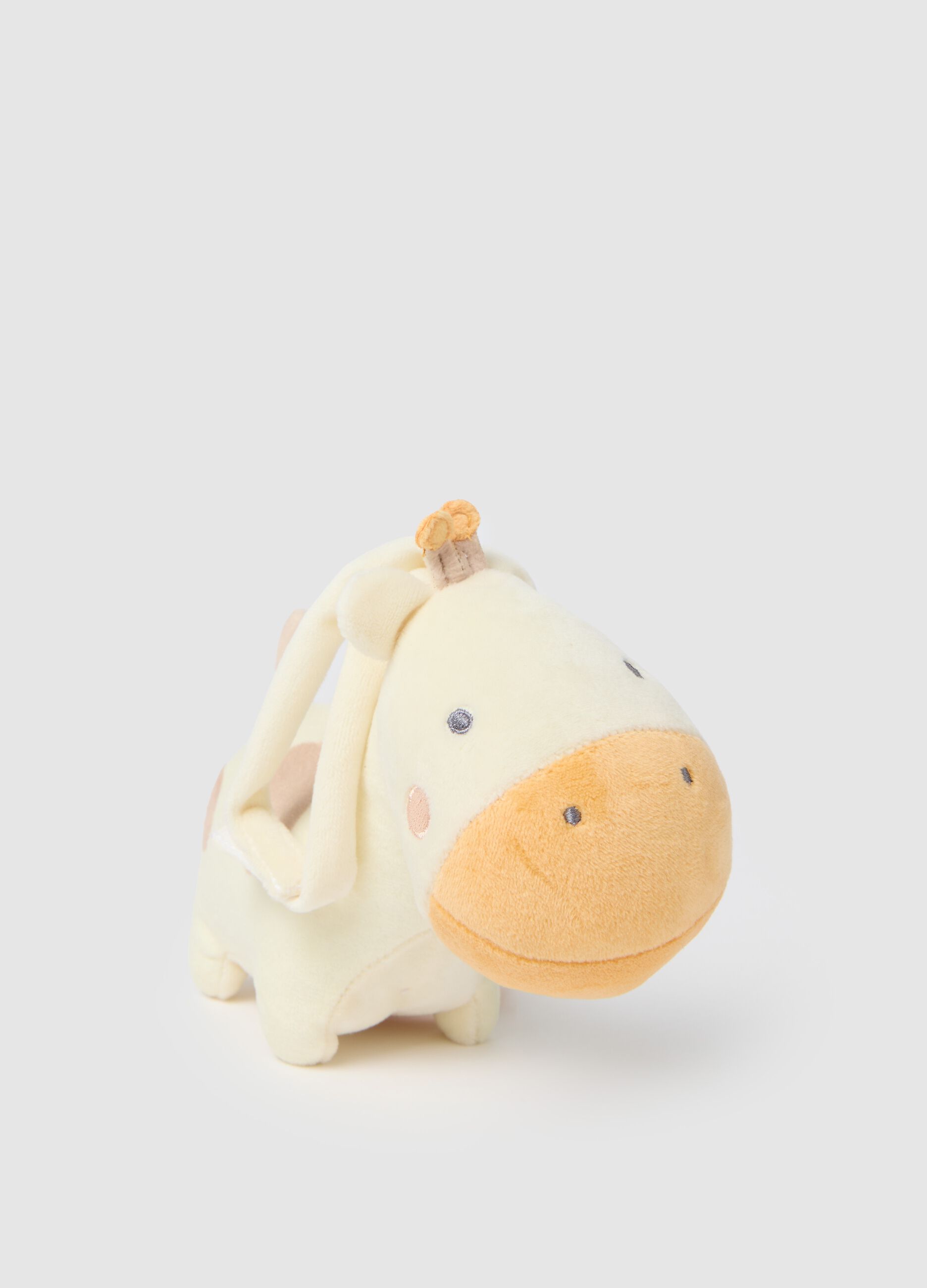 Giraffe-shaped velour music box