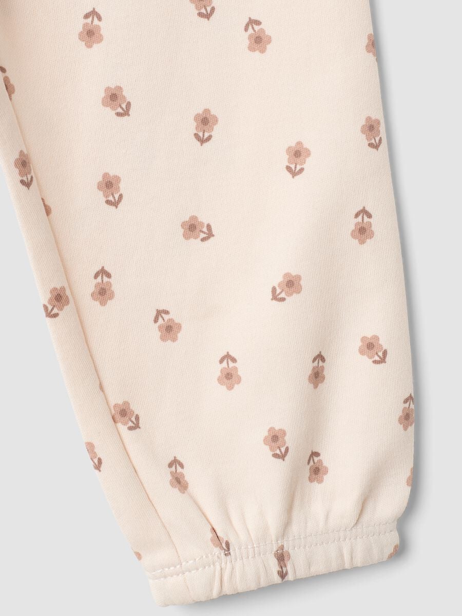 Pigiama rosa in puro cotone organico con stampa floreale per neonata e bimba_3