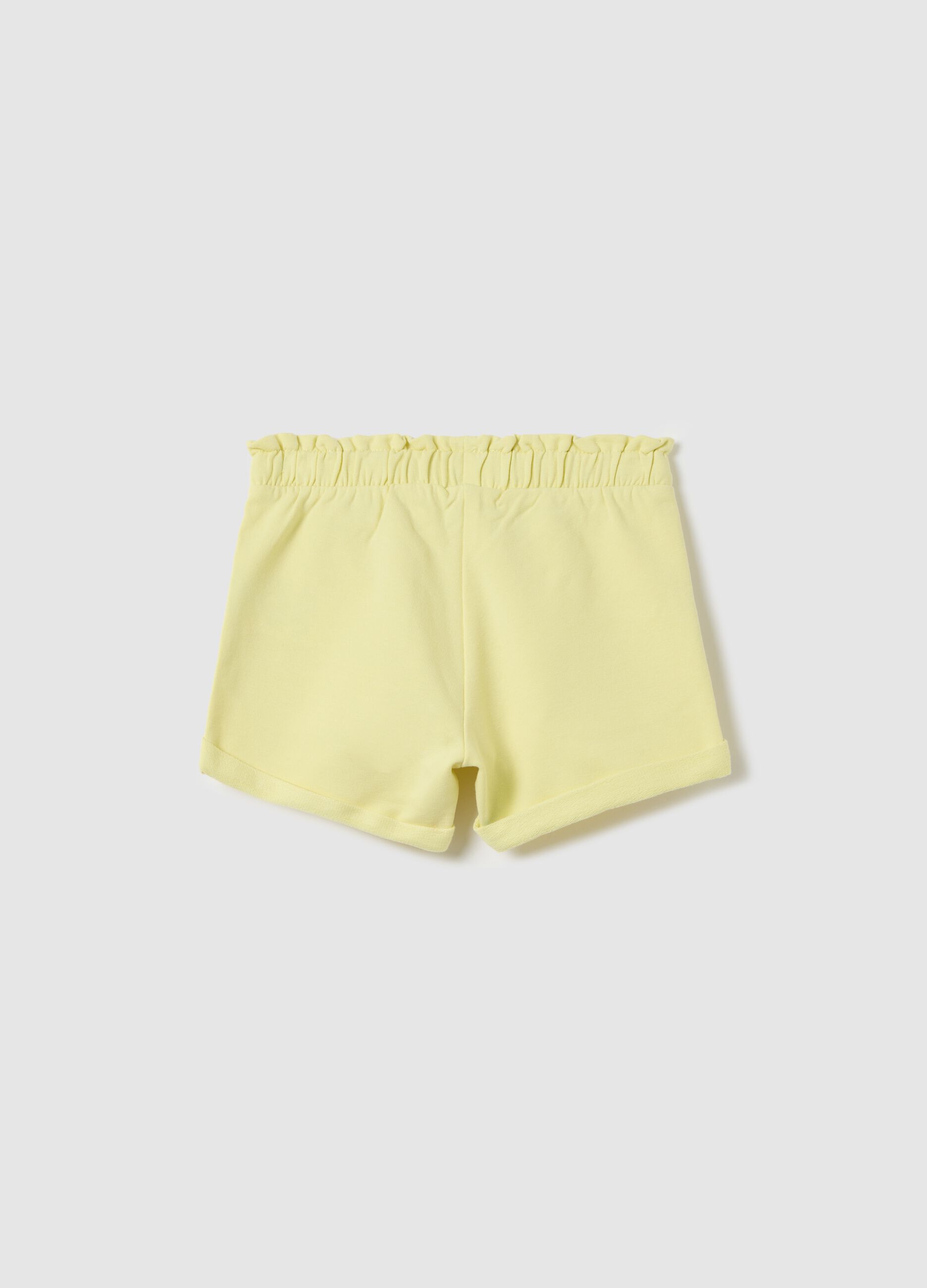 Yellow French terry shorts with bow and frills