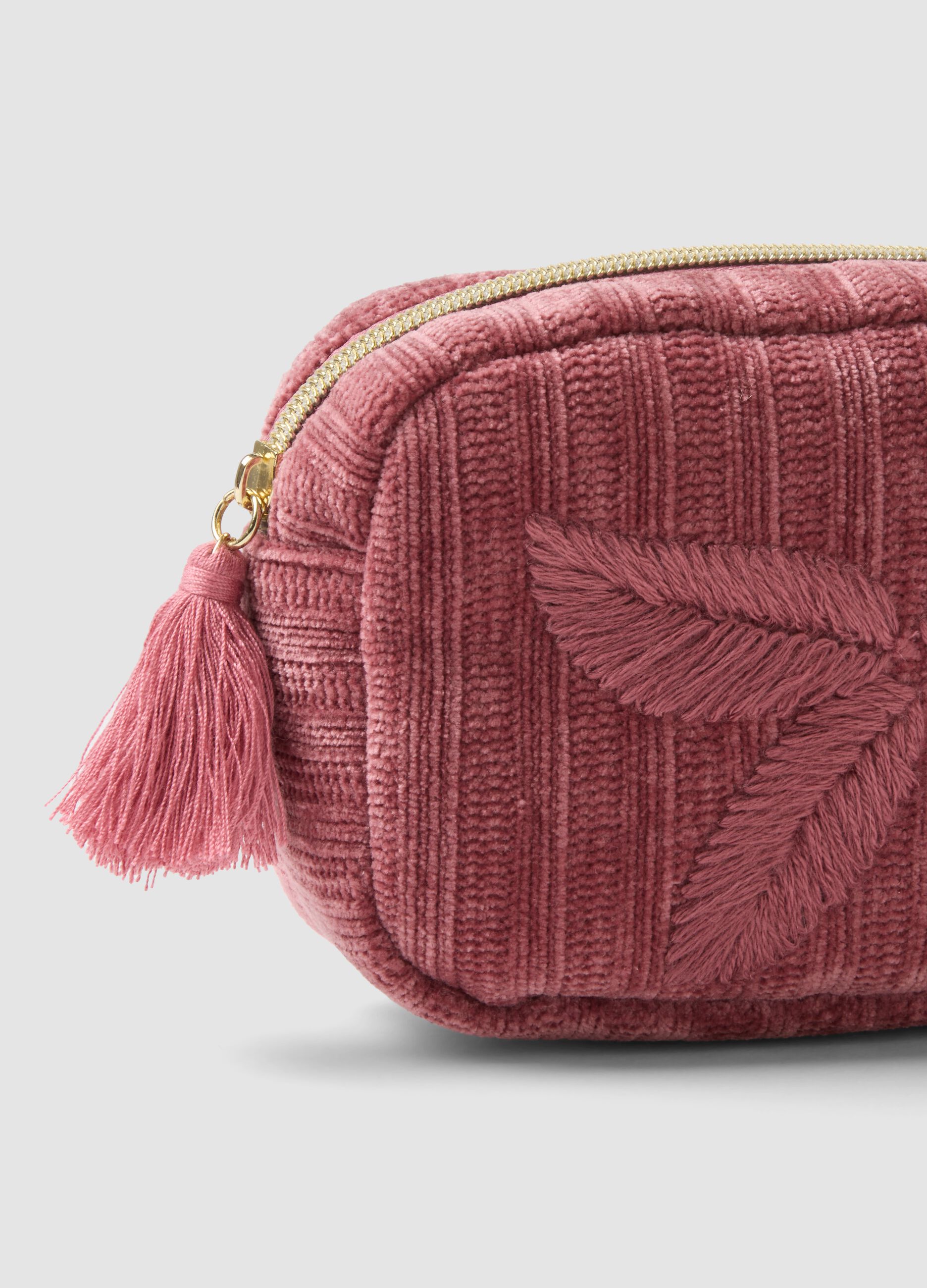 Beauty case rosa con ricamo floreale e nappina