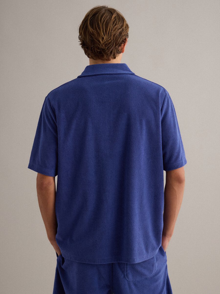 Polo blu in misto cotone regular fit con taschino_3