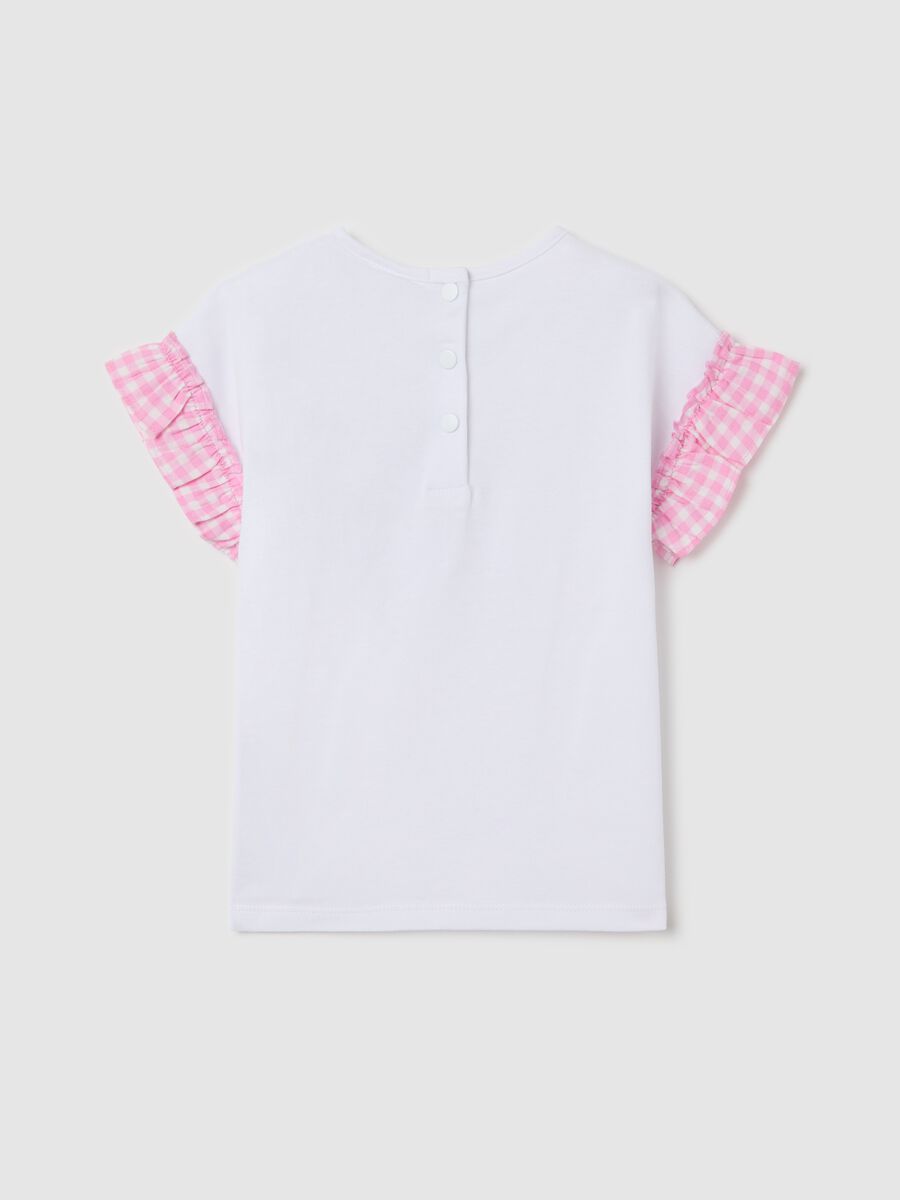 White T-shirt with flounce and cupcake application_1