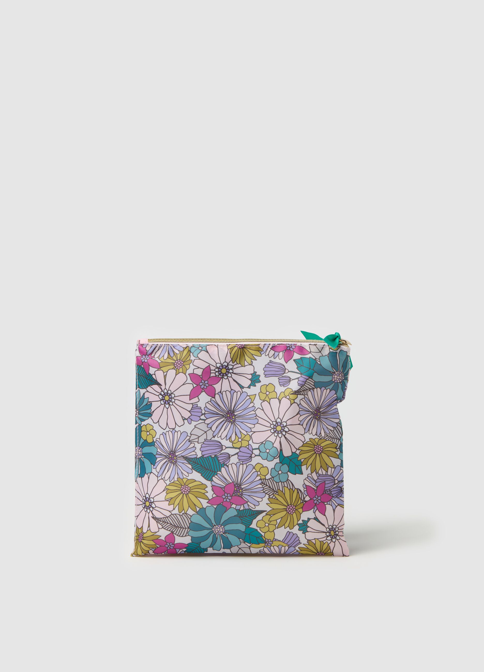 Travel clutch with floral print