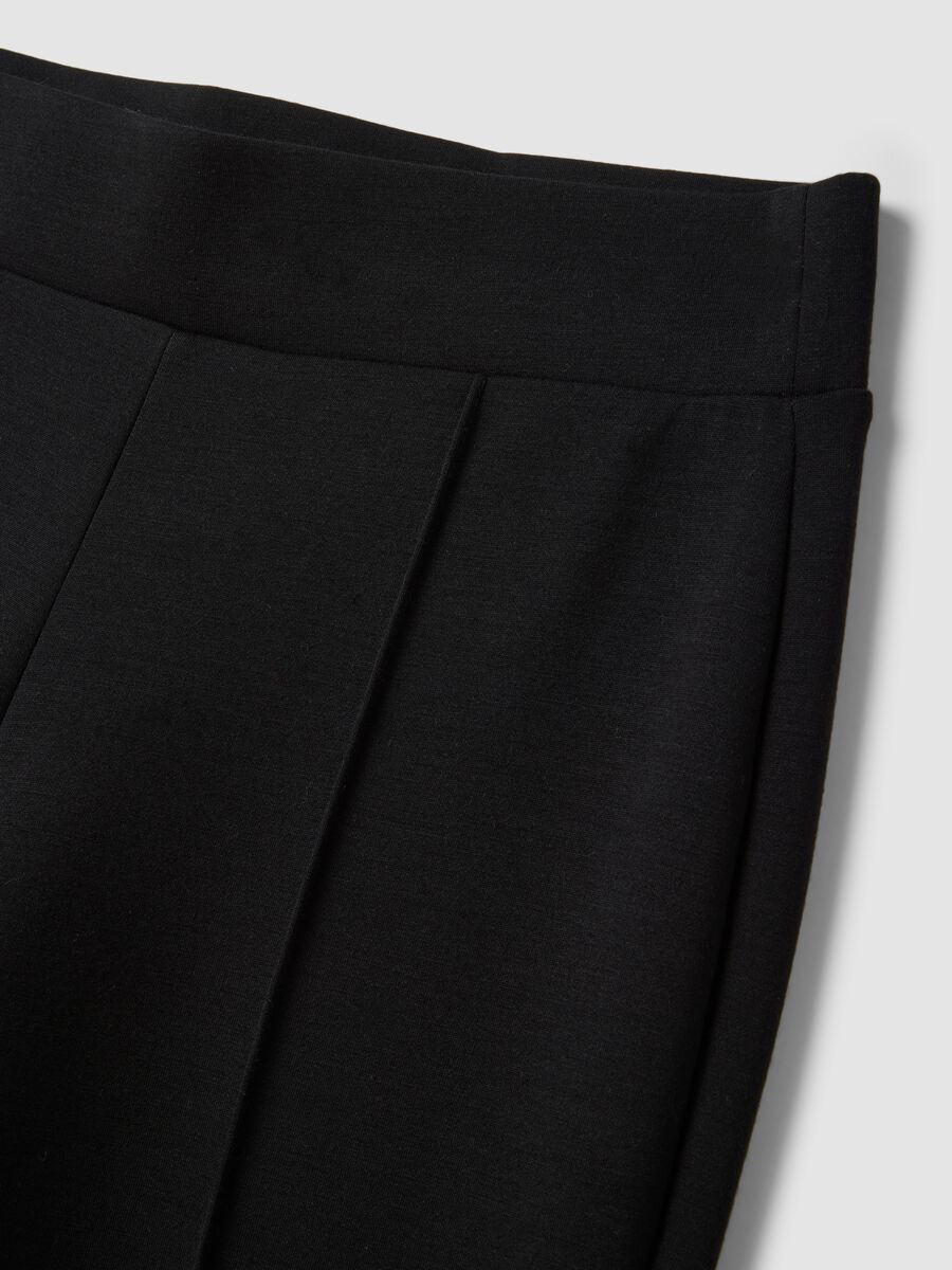 Black flared trousers in stretch modal_1
