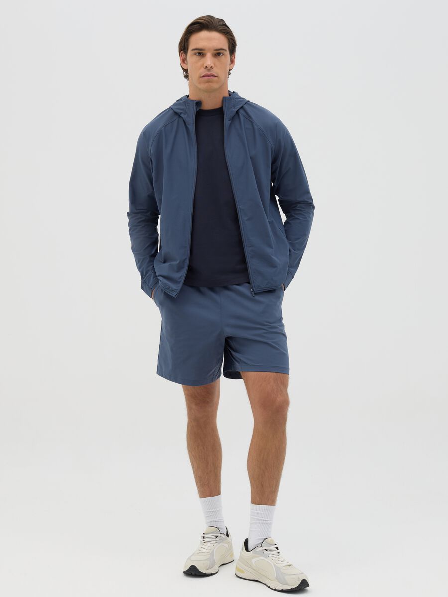 Blue Bermuda joggers in stretch fabric_0