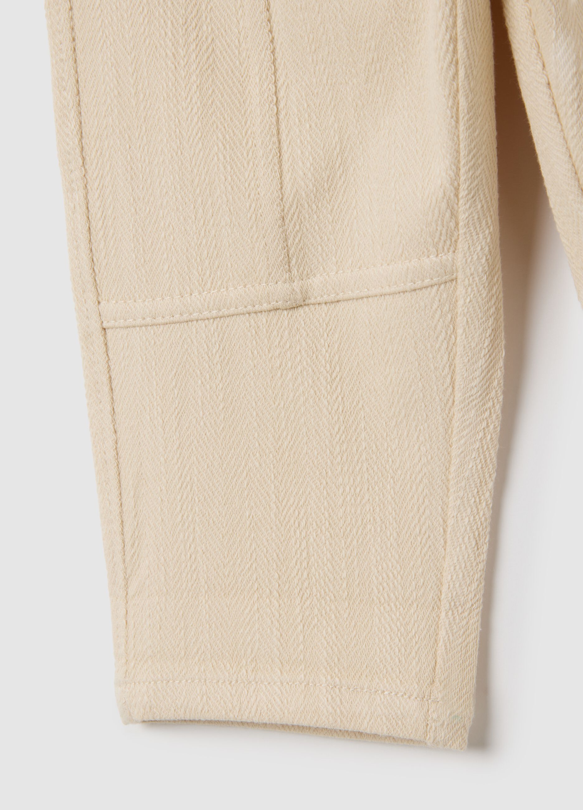 Children's trousers in beige cotton blend over