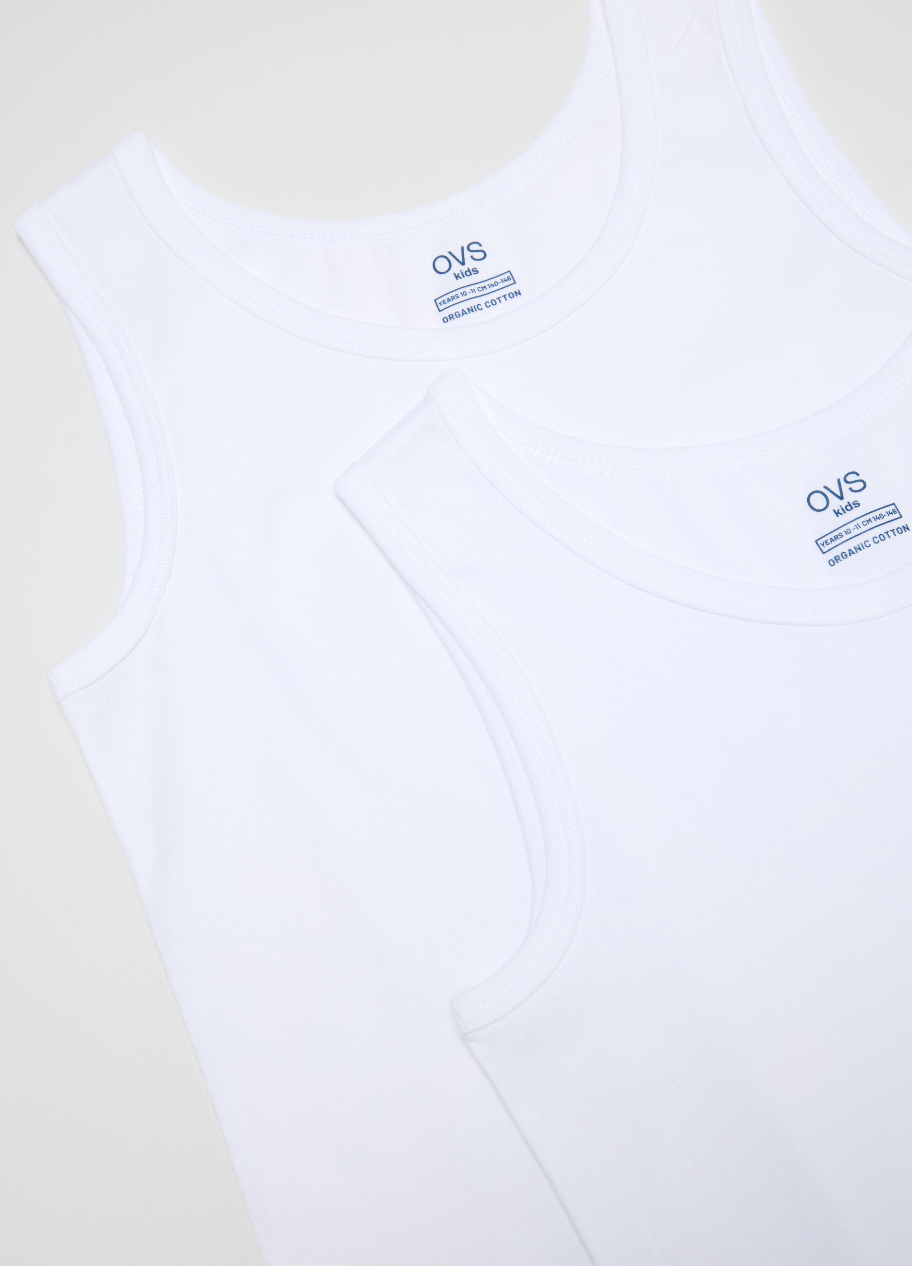 Twin pack of white cotton vests for boys, regular fit