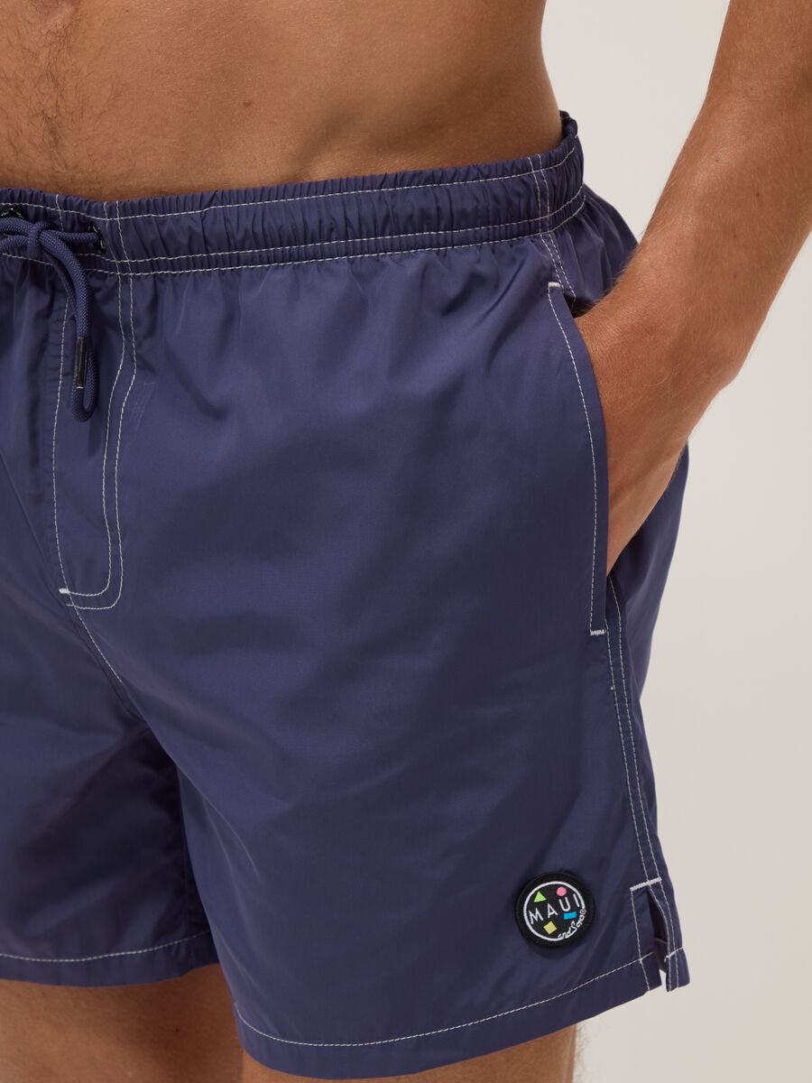 Blue swim shorts with drawstring waist_4