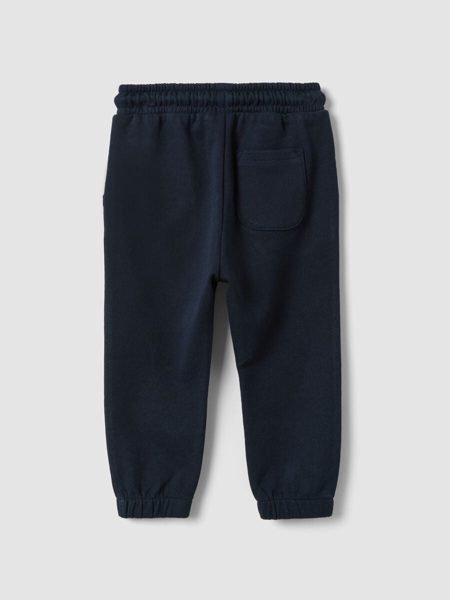 Pantaloni jogger blu in puro cotone organico con coulisse per bimbo_1