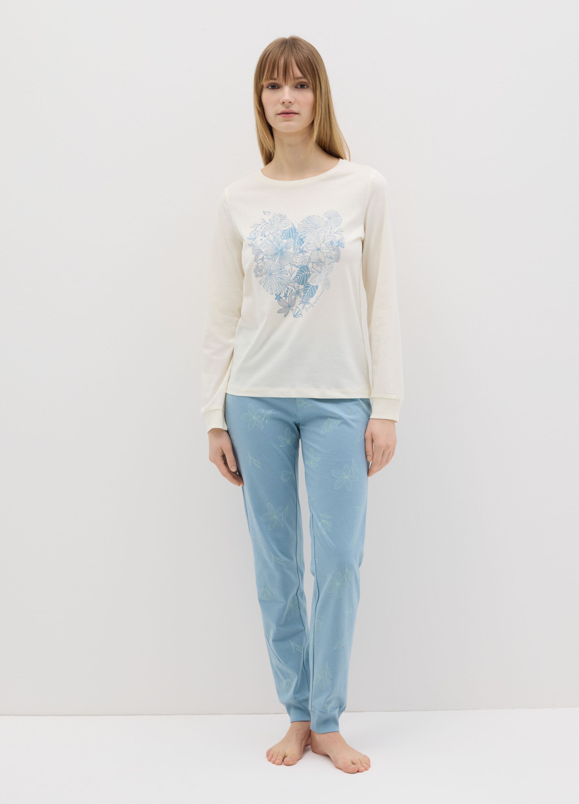 White and light blue cotton pyjamas with floral print