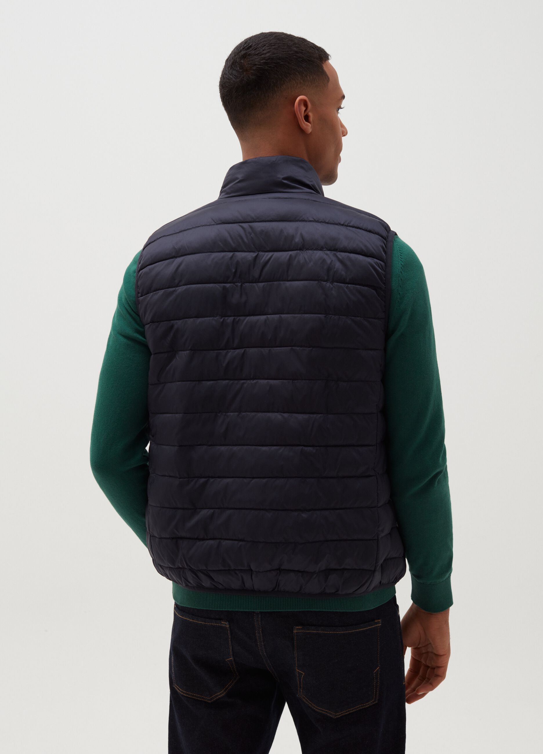 Down gilet with high neck